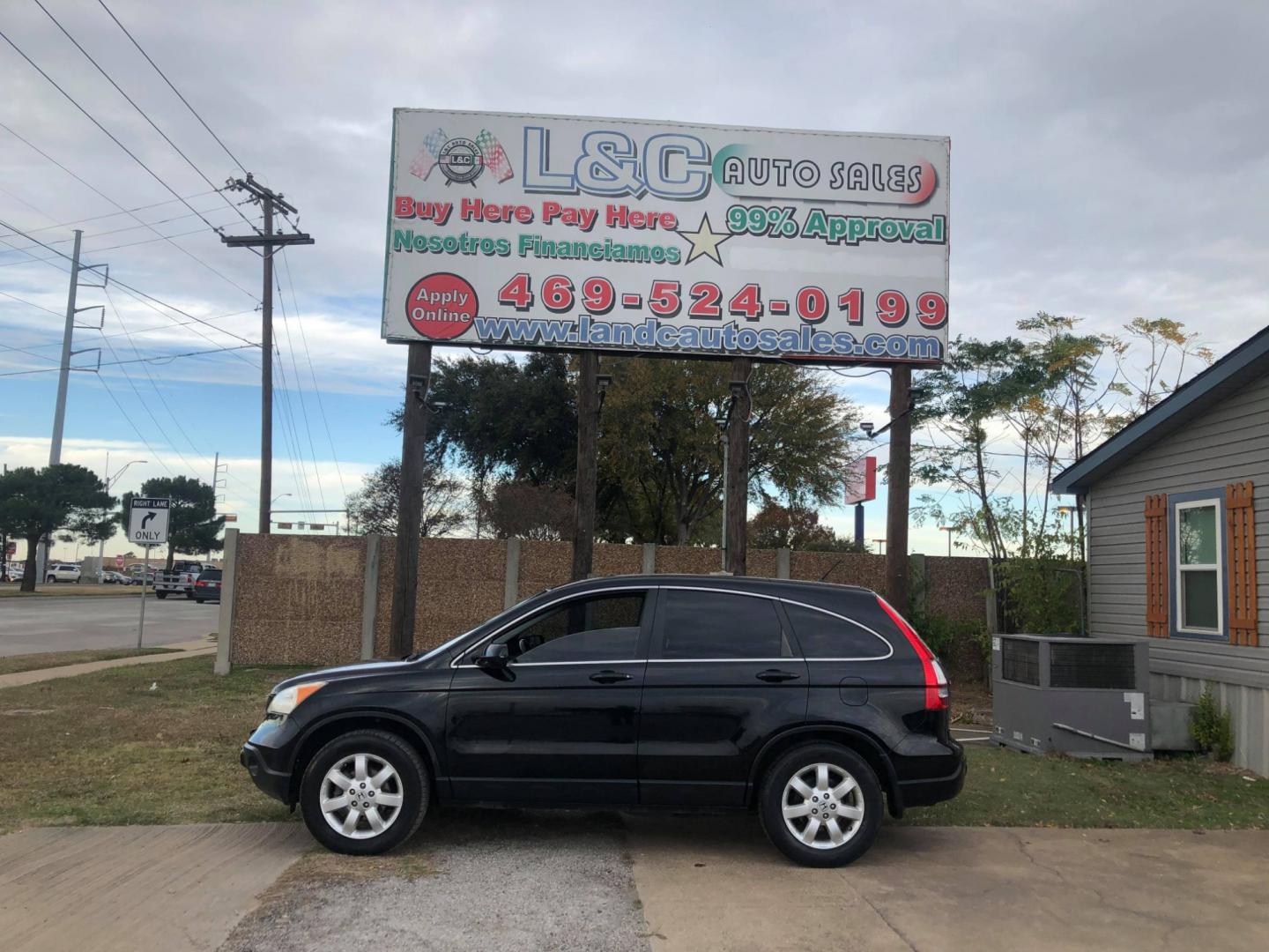 2007 Black Honda CR-V EX-L 2WD AT (JHLRE38727C) with an 2.4L L4 DOHC 16V engine, Automatic transmission, located at 1830 North Belt Line Road, Irving, TX, 75061, (469) 524-0199, 32.834373, -96.993584 - Photo#0