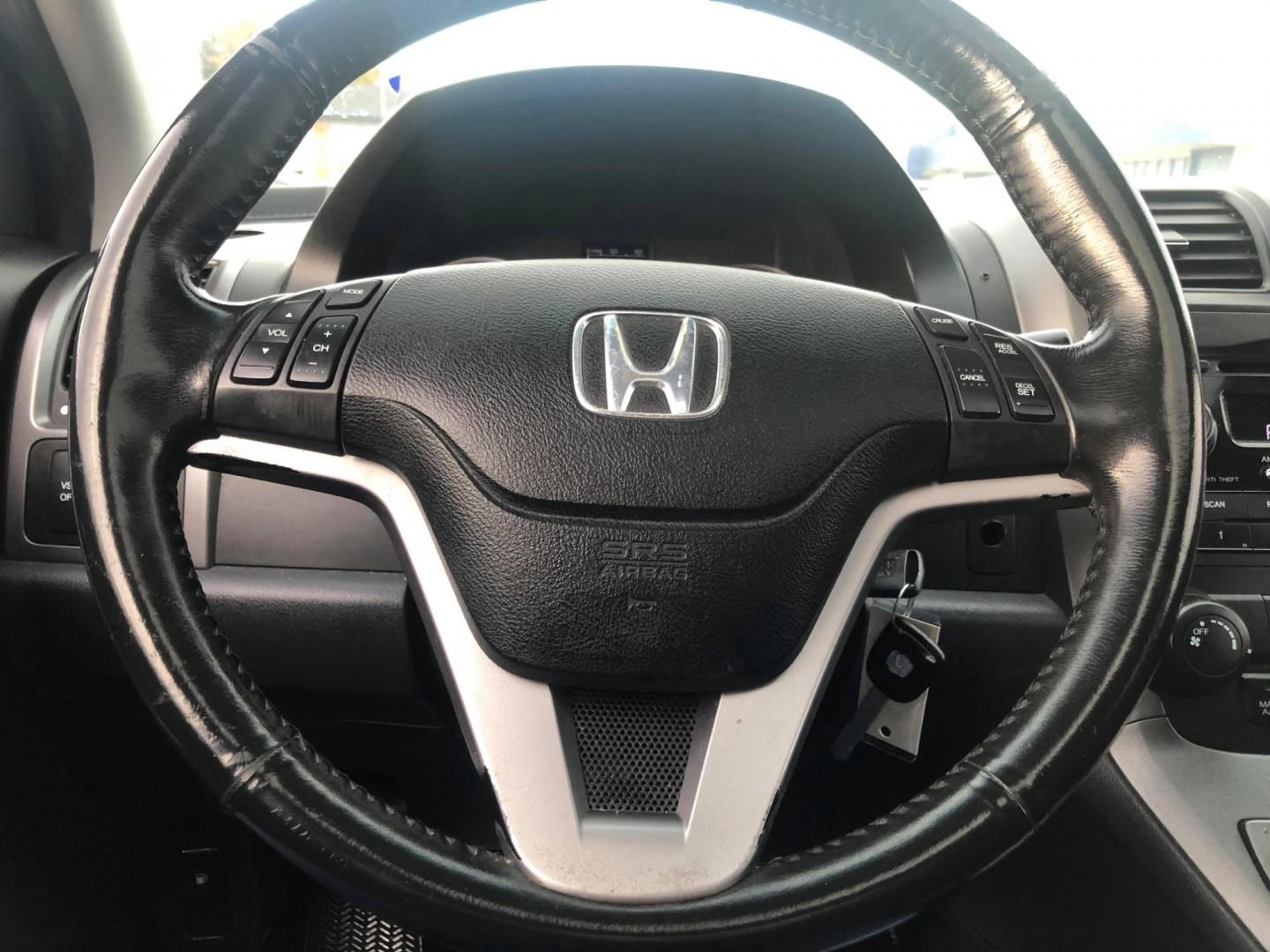 2007 Black Honda CR-V EX-L 2WD AT (JHLRE38727C) with an 2.4L L4 DOHC 16V engine, Automatic transmission, located at 1830 North Belt Line Road, Irving, TX, 75061, (469) 524-0199, 32.834373, -96.993584 - Photo#11