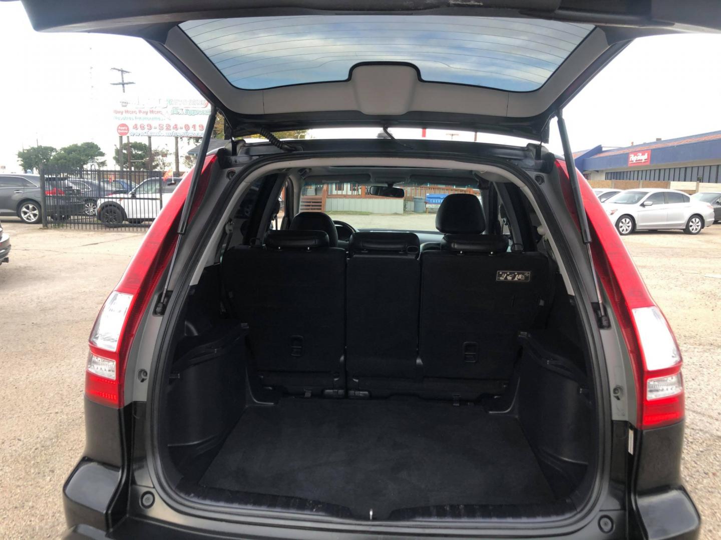 2007 Black Honda CR-V EX-L 2WD AT (JHLRE38727C) with an 2.4L L4 DOHC 16V engine, Automatic transmission, located at 1830 North Belt Line Road, Irving, TX, 75061, (469) 524-0199, 32.834373, -96.993584 - Photo#14