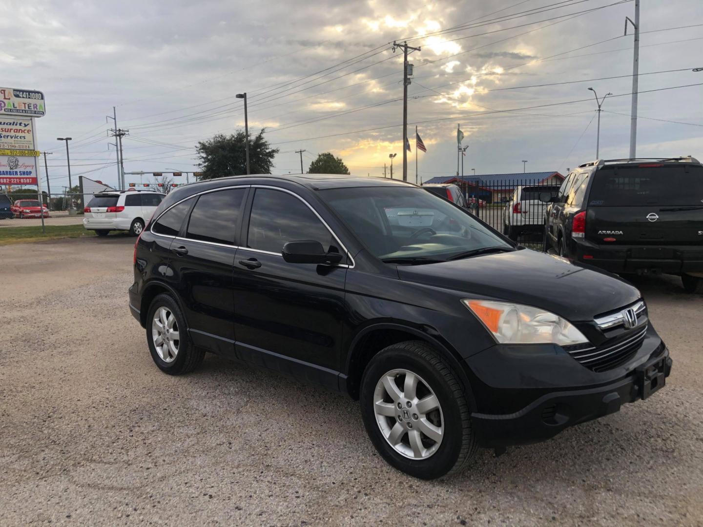 2007 Black Honda CR-V EX-L 2WD AT (JHLRE38727C) with an 2.4L L4 DOHC 16V engine, Automatic transmission, located at 1830 North Belt Line Road, Irving, TX, 75061, (469) 524-0199, 32.834373, -96.993584 - Photo#1