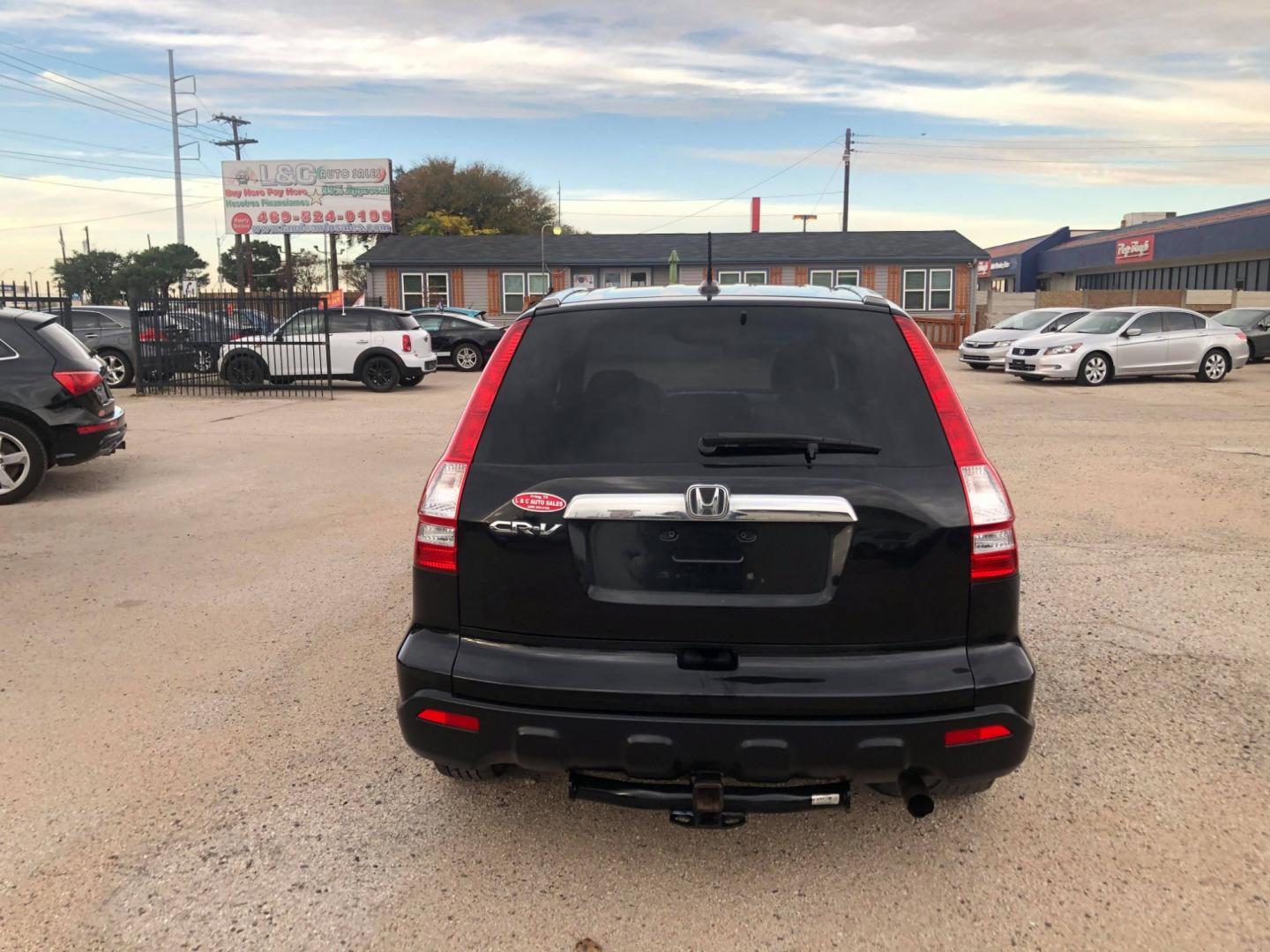 2007 Black Honda CR-V EX-L 2WD AT (JHLRE38727C) with an 2.4L L4 DOHC 16V engine, Automatic transmission, located at 1830 North Belt Line Road, Irving, TX, 75061, (469) 524-0199, 32.834373, -96.993584 - Photo#6