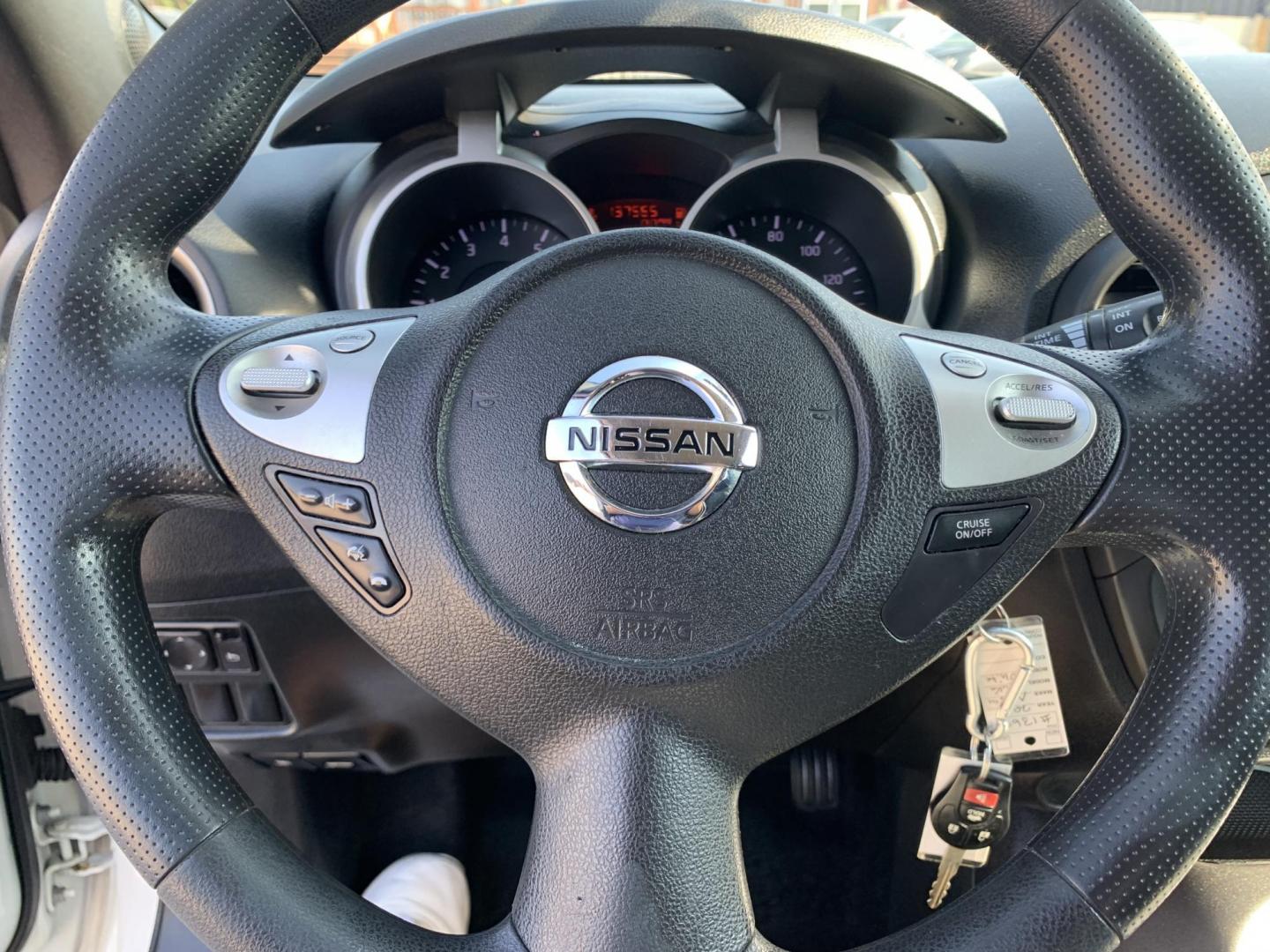 2014 White /Black Nissan Juke S FWD (JN8AF5MR5ET) with an 1.6L L4 DOHC 16V engine, Automatic transmission, located at 1830 North Belt Line Road, Irving, TX, 75061, (469) 524-0199, 32.834373, -96.993584 - Photo#12