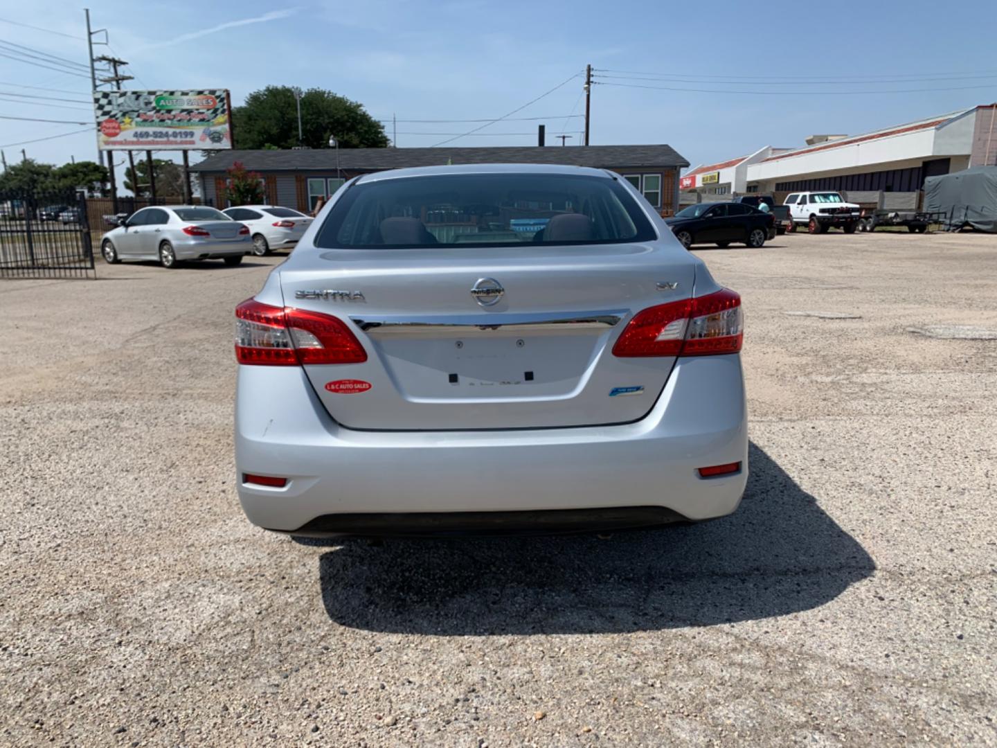 2014 SILVER /Gray Nissan Sentra (1N4AB7AP5EN) with an 1.8L L4 SFI DOHC 16V engine, Automatic transmission, located at 1830 North Belt Line Road, Irving, TX, 75061, (469) 524-0199, 32.834373, -96.993584 - Photo#4