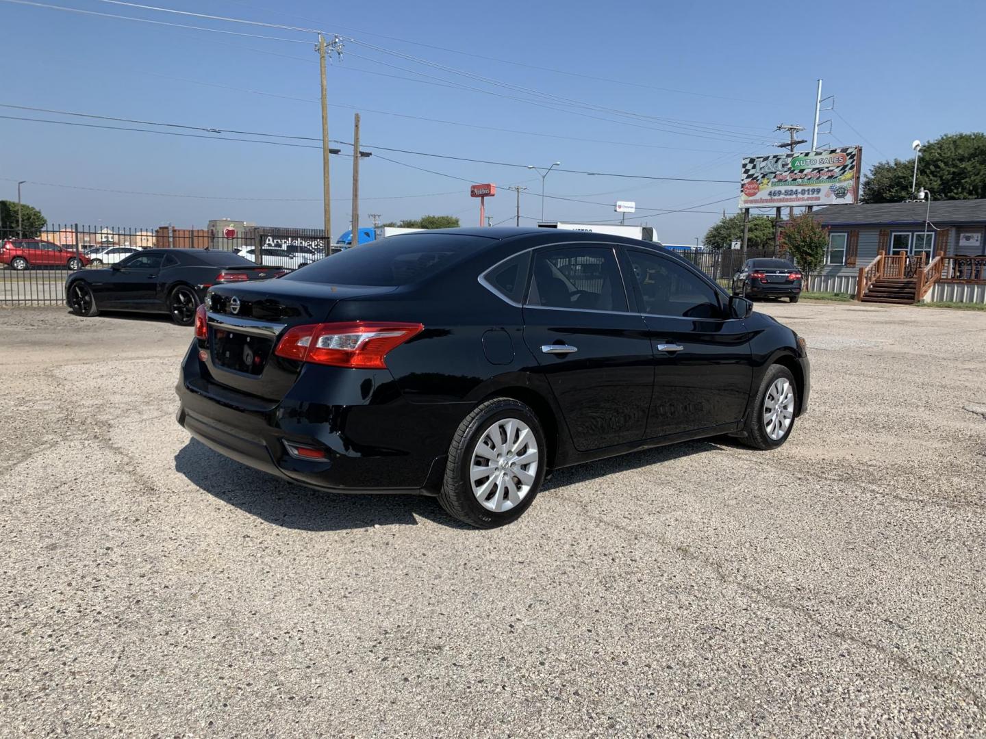 2016 Black /Black Nissan Sentra FE+ S (3N1AB7AP3GY) with an 1.8L L4 SFI DOHC 16V engine, AUTOMATIC transmission, located at 1830 North Belt Line Road, Irving, TX, 75061, (469) 524-0199, 32.834373, -96.993584 - Photo#5