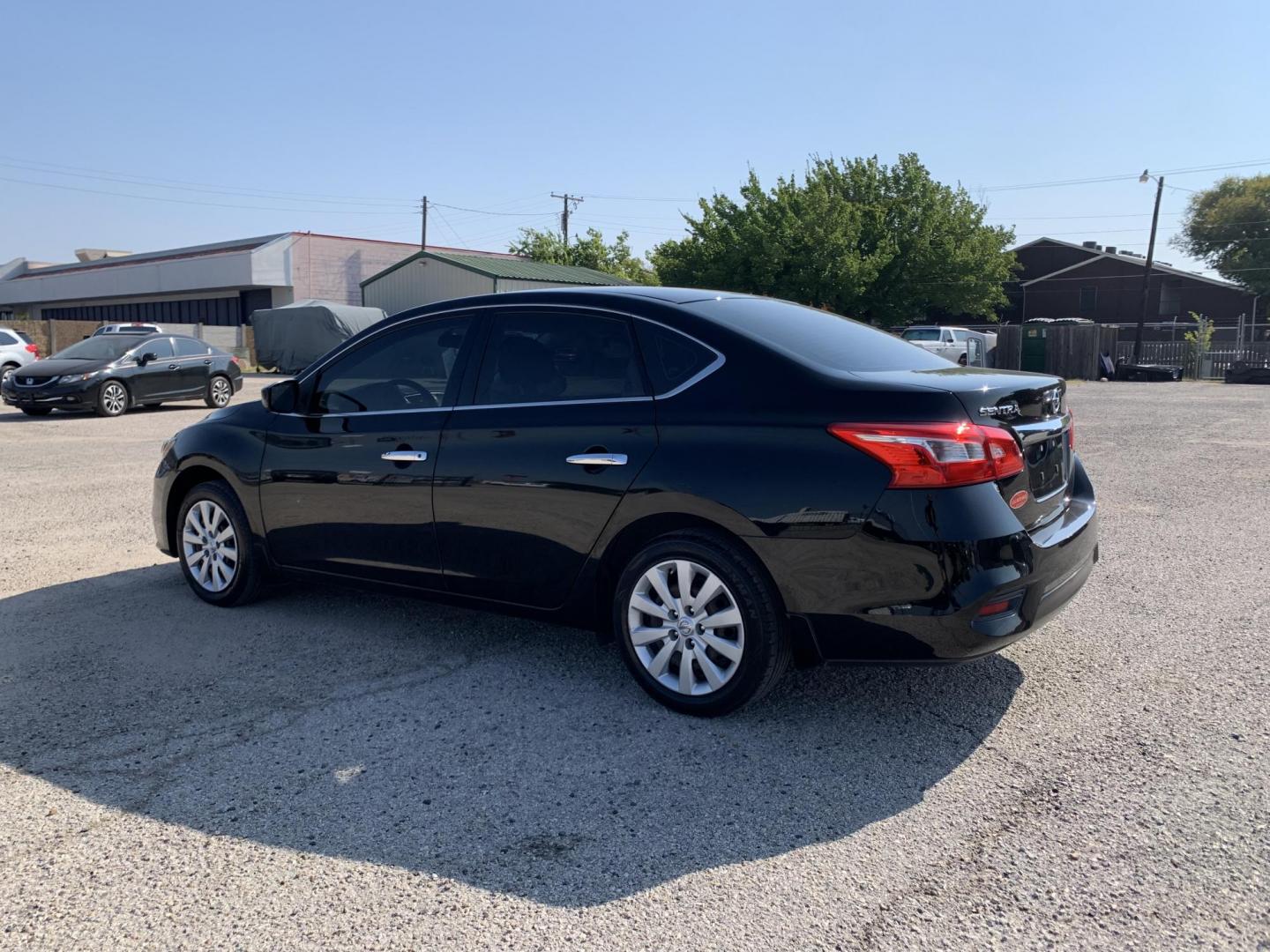 2016 Black /Black Nissan Sentra FE+ S (3N1AB7AP3GY) with an 1.8L L4 SFI DOHC 16V engine, AUTOMATIC transmission, located at 1830 North Belt Line Road, Irving, TX, 75061, (469) 524-0199, 32.834373, -96.993584 - Photo#3