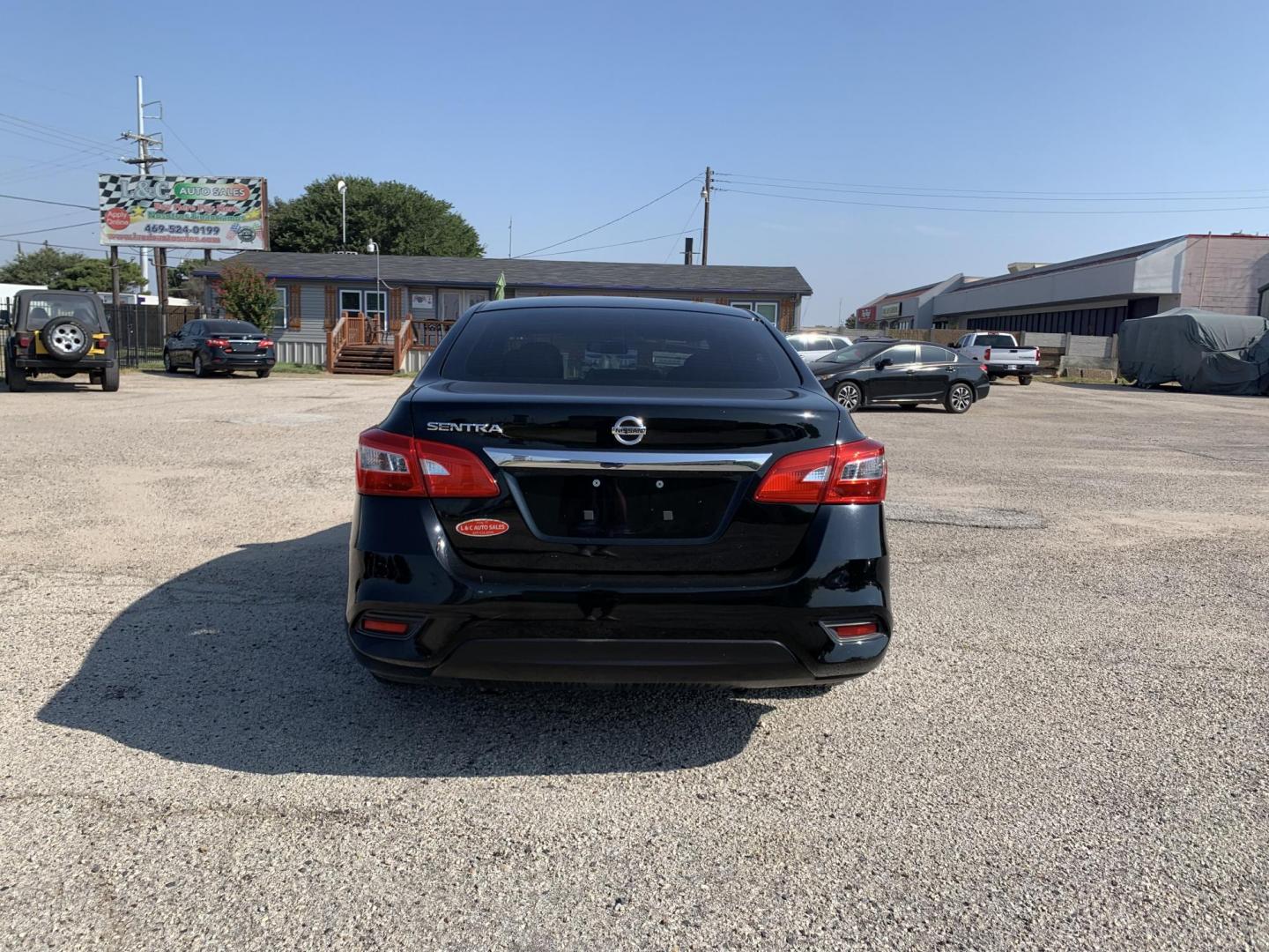 2016 Black /Black Nissan Sentra FE+ S (3N1AB7AP3GY) with an 1.8L L4 SFI DOHC 16V engine, AUTOMATIC transmission, located at 1830 North Belt Line Road, Irving, TX, 75061, (469) 524-0199, 32.834373, -96.993584 - Photo#4