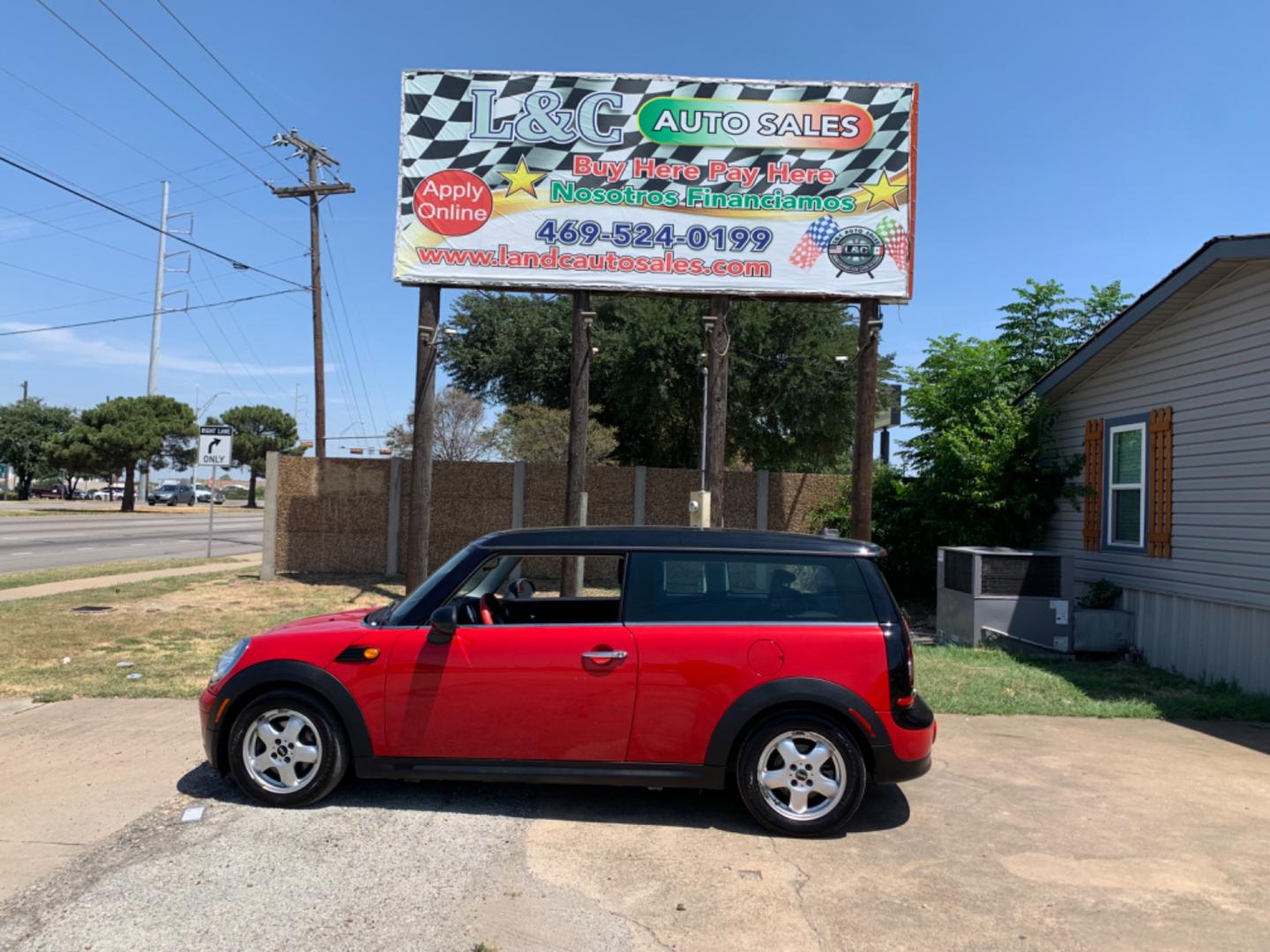 2009 Red /Black Mini Clubman Base (WMWML33599T) with an 1.6L L4 DOHC 16V engine, Automatic transmission, located at 1830 North Belt Line Road, Irving, TX, 75061, (469) 524-0199, 32.834373, -96.993584 - Photo#0