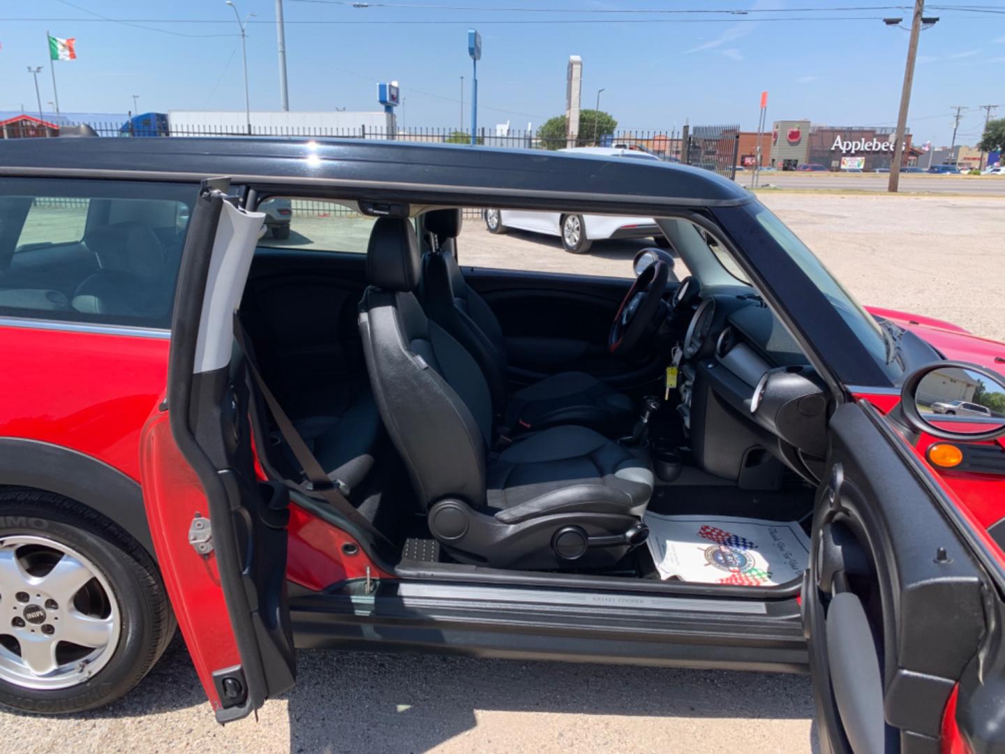 2009 Red /Black Mini Clubman Base (WMWML33599T) with an 1.6L L4 DOHC 16V engine, Automatic transmission, located at 1830 North Belt Line Road, Irving, TX, 75061, (469) 524-0199, 32.834373, -96.993584 - Photo#9