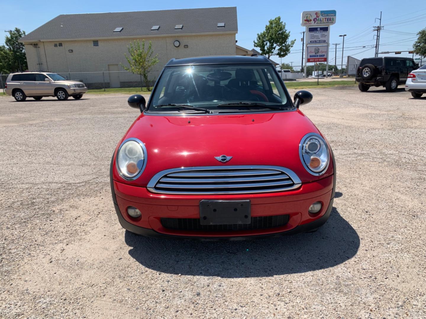 2009 Red /Black Mini Clubman Base (WMWML33599T) with an 1.6L L4 DOHC 16V engine, Automatic transmission, located at 1830 North Belt Line Road, Irving, TX, 75061, (469) 524-0199, 32.834373, -96.993584 - Photo#1