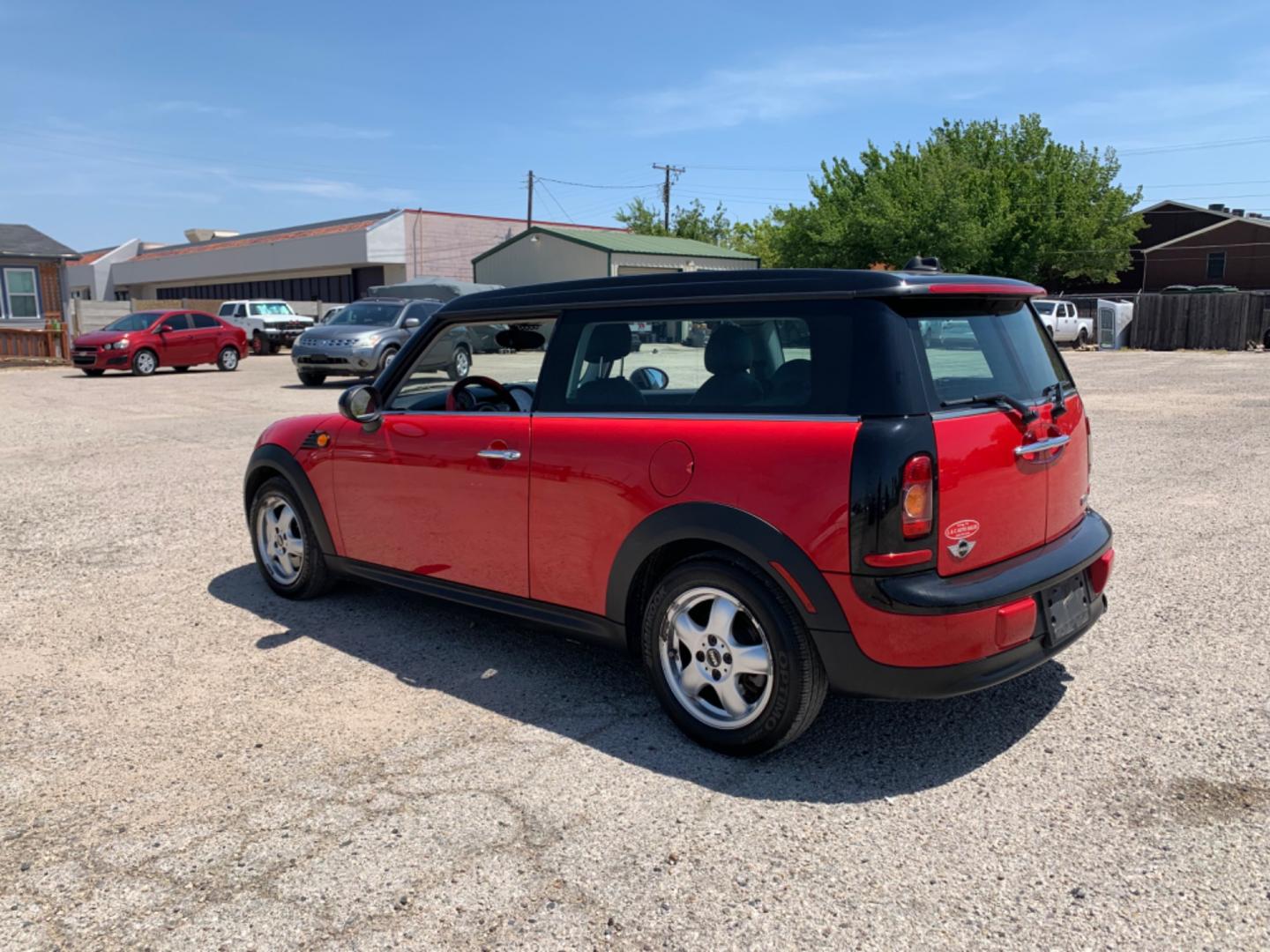 2009 Red /Black Mini Clubman Base (WMWML33599T) with an 1.6L L4 DOHC 16V engine, Automatic transmission, located at 1830 North Belt Line Road, Irving, TX, 75061, (469) 524-0199, 32.834373, -96.993584 - Photo#3