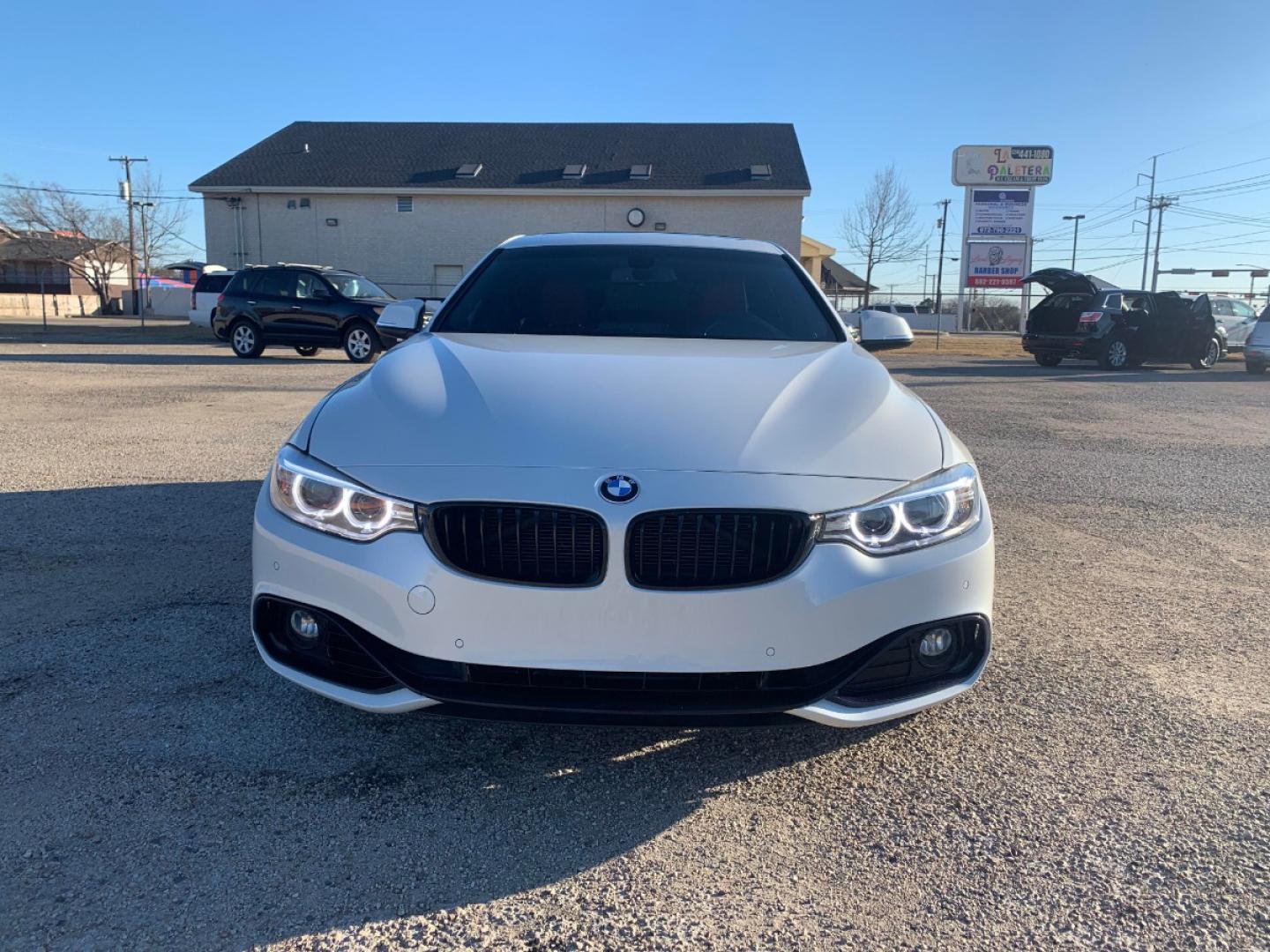 2016 White /Red BMW 4-Series Gran Coupe 428i SULEV (WBA4A9C59GG) with an 2.0L L4 DOHC 16V engine, 8A transmission, located at 1830 North Belt Line Road, Irving, TX, 75061, (469) 524-0199, 32.834373, -96.993584 - Owners personal vehicle. Runs and drives perfect! Rebuilt Title CASH ONLY CASH ONLY CASH ONLY CASH ONLY - Photo#5