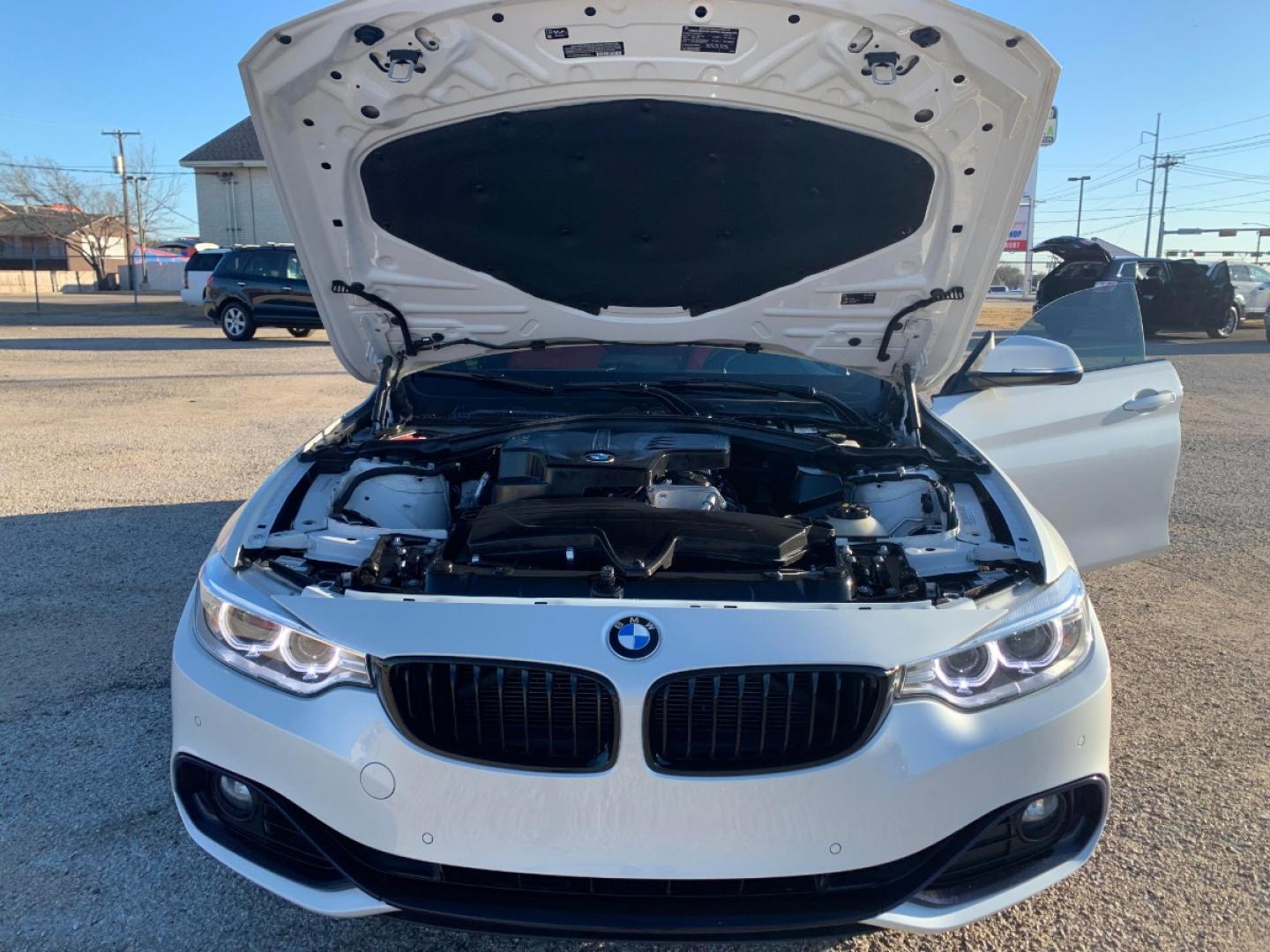 2016 White /Red BMW 4-Series Gran Coupe 428i SULEV (WBA4A9C59GG) with an 2.0L L4 DOHC 16V engine, 8A transmission, located at 1830 North Belt Line Road, Irving, TX, 75061, (469) 524-0199, 32.834373, -96.993584 - Owners personal vehicle. Runs and drives perfect! Rebuilt Title CASH ONLY CASH ONLY CASH ONLY CASH ONLY - Photo#7