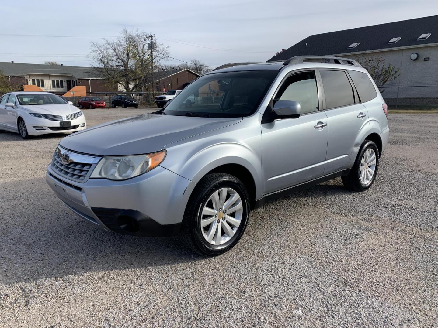 2012 Silver /Black Subaru Forester 2.5X Premium (JF2SHBCC7CH) with an 2.5L H4 SOHC 16V engine, Automatic transmission, located at 1830 North Belt Line Road, Irving, TX, 75061, (469) 524-0199, 32.834373, -96.993584 - Photo#3