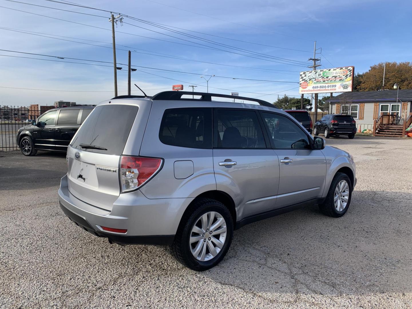 2012 Silver /Black Subaru Forester 2.5X Premium (JF2SHBCC7CH) with an 2.5L H4 SOHC 16V engine, Automatic transmission, located at 1830 North Belt Line Road, Irving, TX, 75061, (469) 524-0199, 32.834373, -96.993584 - Photo#9