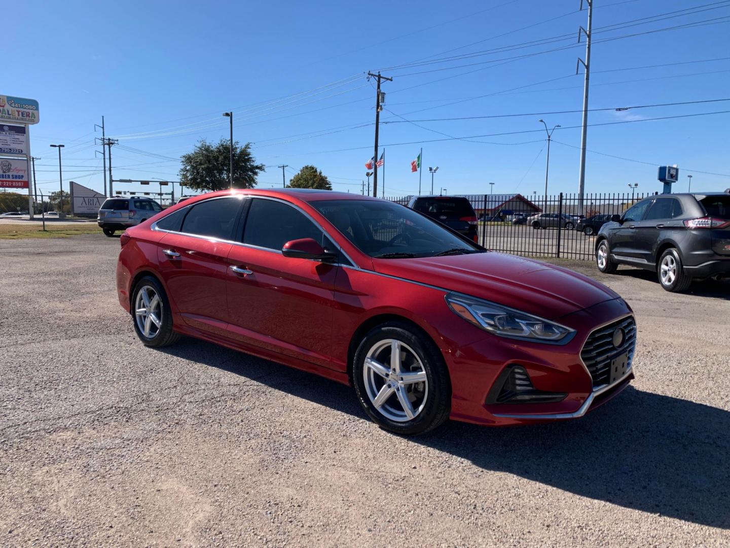 2018 Maroon /Tan Hyundai Sonata Sport (5NPE34AF8JH) with an 2.4L L4 DOHC 16V engine, AUTOMATIC transmission, located at 1830 North Belt Line Road, Irving, TX, 75061, (469) 524-0199, 32.834373, -96.993584 - Photo#1