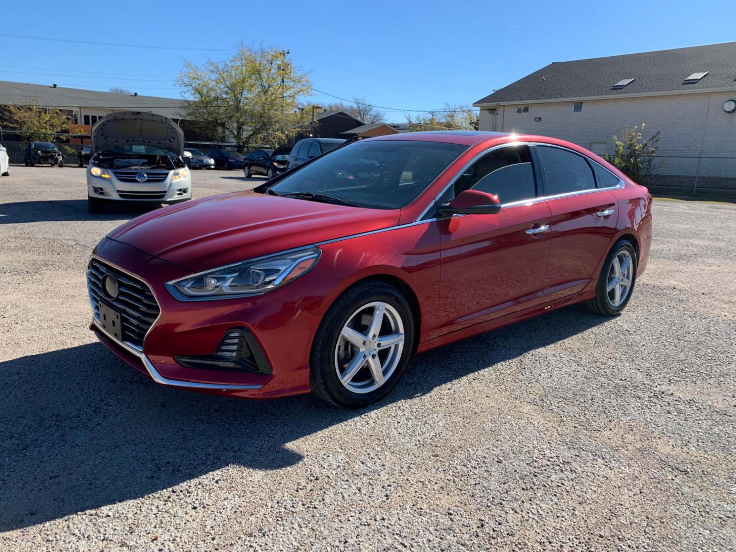 2018 Maroon /Tan Hyundai Sonata Sport (5NPE34AF8JH) with an 2.4L L4 DOHC 16V engine, AUTOMATIC transmission, located at 1830 North Belt Line Road, Irving, TX, 75061, (469) 524-0199, 32.834373, -96.993584 - Photo#2