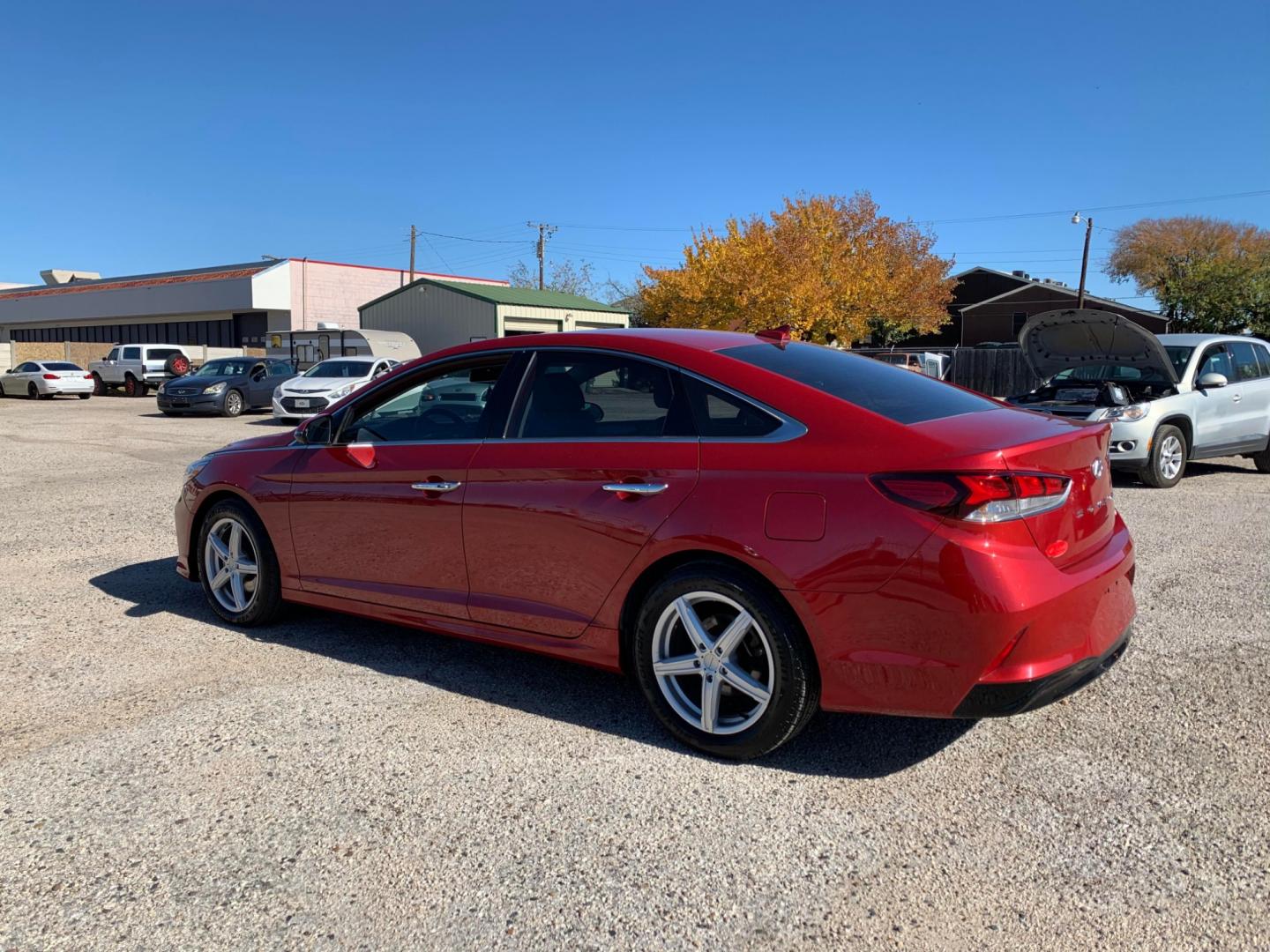 2018 Maroon /Tan Hyundai Sonata Sport (5NPE34AF8JH) with an 2.4L L4 DOHC 16V engine, AUTOMATIC transmission, located at 1830 North Belt Line Road, Irving, TX, 75061, (469) 524-0199, 32.834373, -96.993584 - Photo#4