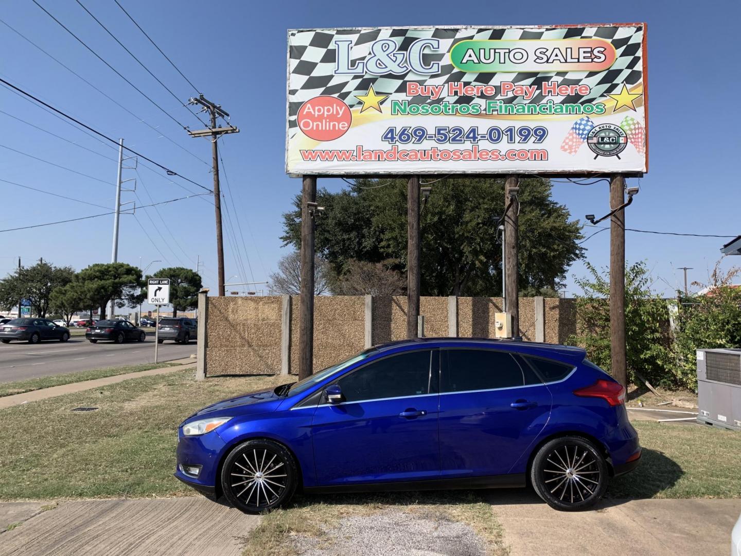 2015 Blue /Black Ford Focus Titanium Hatch (1FADP3N21FL) with an 2.0L L4 DOHC 16V engine, Automatic transmission, located at 1830 North Belt Line Road, Irving, TX, 75061, (469) 524-0199, 32.834373, -96.993584 - Photo#0