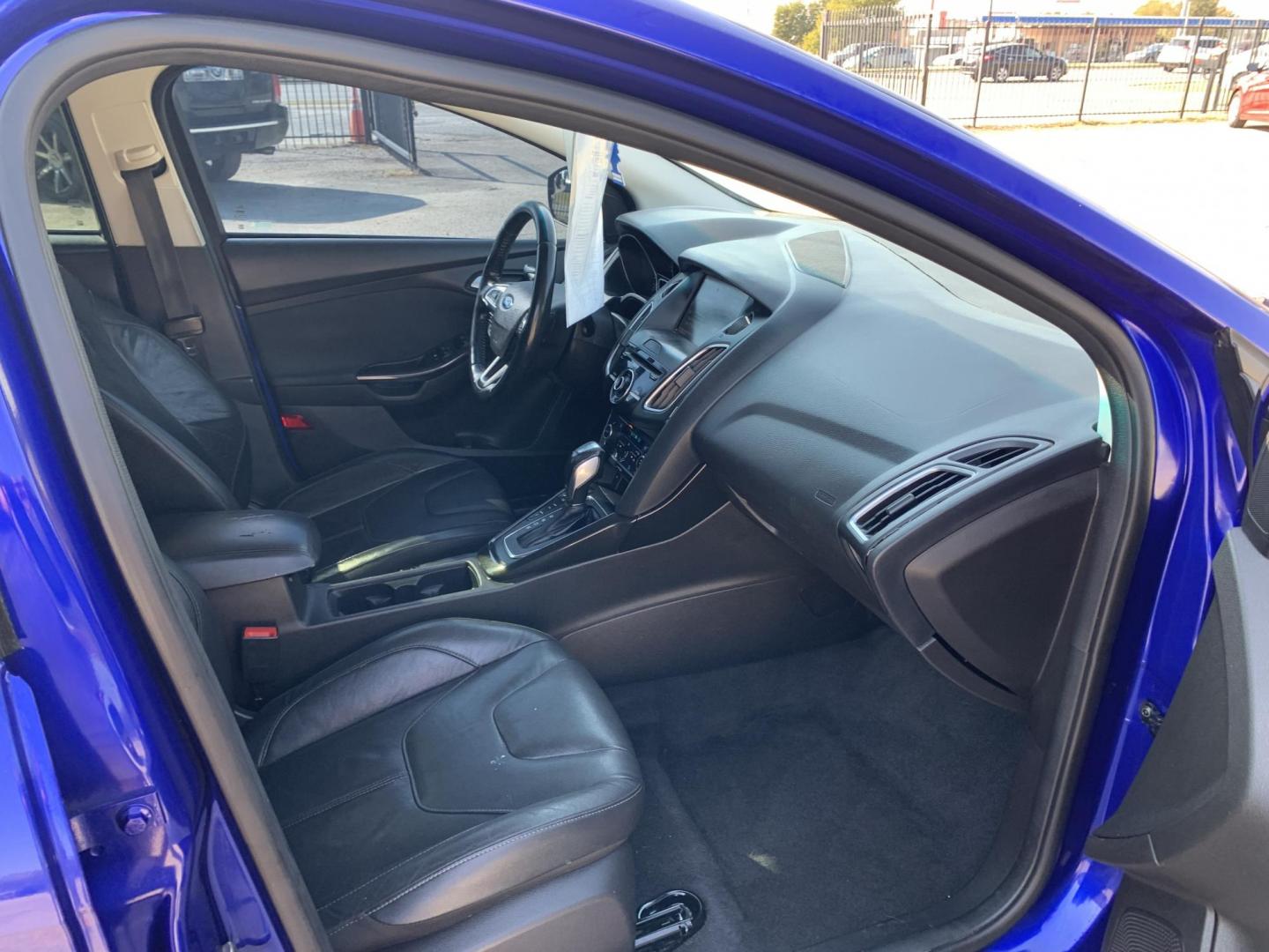 2015 Blue /Black Ford Focus Titanium Hatch (1FADP3N21FL) with an 2.0L L4 DOHC 16V engine, Automatic transmission, located at 1830 North Belt Line Road, Irving, TX, 75061, (469) 524-0199, 32.834373, -96.993584 - Photo#11