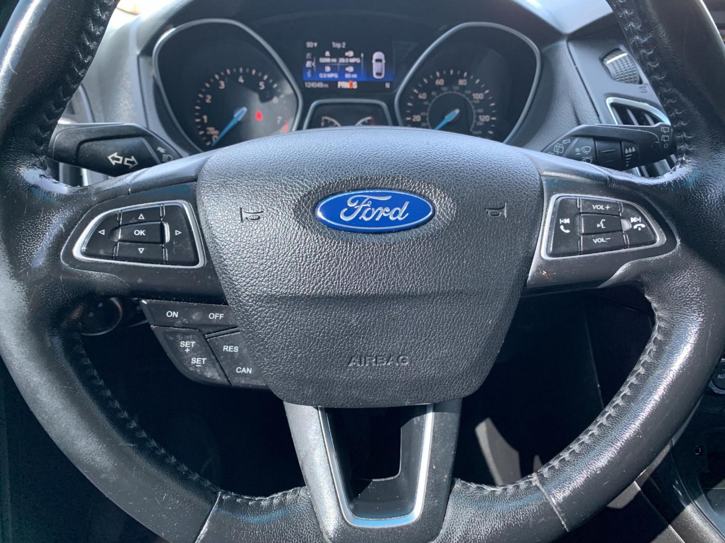 2015 Blue /Black Ford Focus Titanium Hatch (1FADP3N21FL) with an 2.0L L4 DOHC 16V engine, Automatic transmission, located at 1830 North Belt Line Road, Irving, TX, 75061, (469) 524-0199, 32.834373, -96.993584 - Photo#12