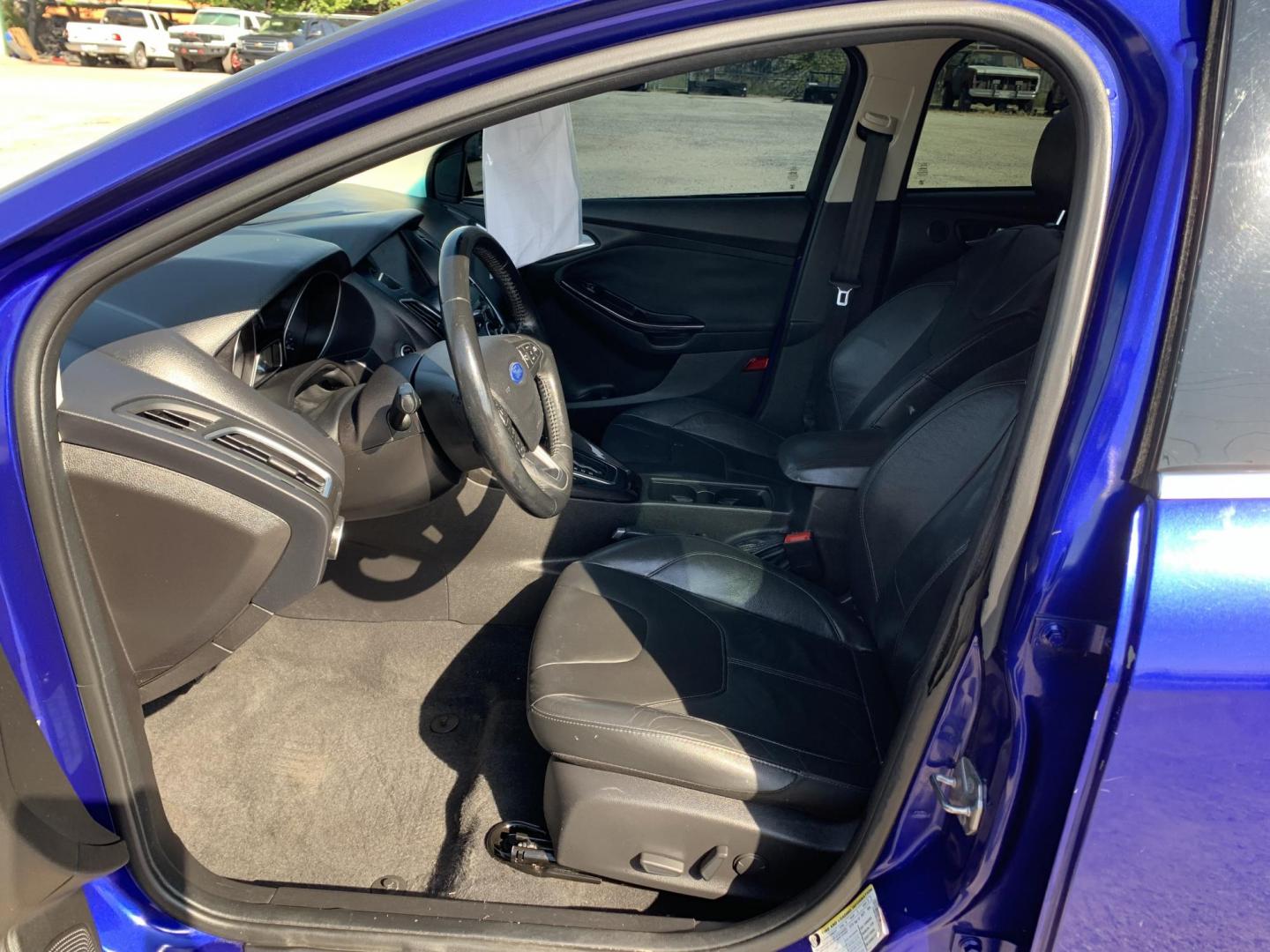 2015 Blue /Black Ford Focus Titanium Hatch (1FADP3N21FL) with an 2.0L L4 DOHC 16V engine, Automatic transmission, located at 1830 North Belt Line Road, Irving, TX, 75061, (469) 524-0199, 32.834373, -96.993584 - Photo#8