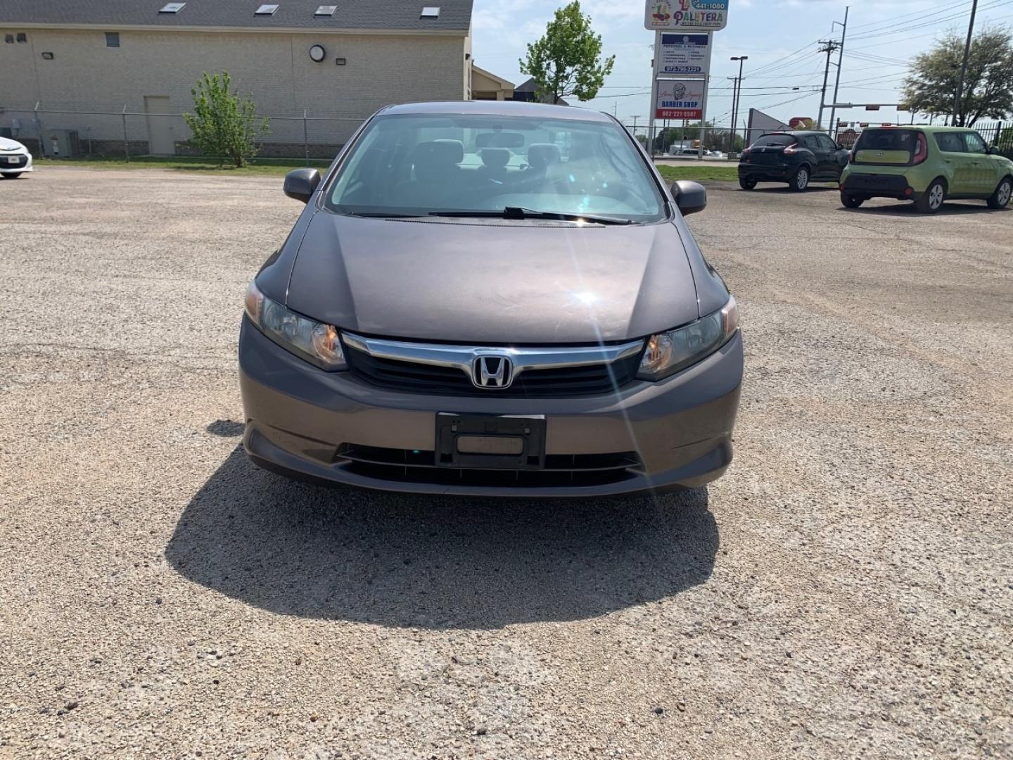 2012 Gold /Tan Honda Civic LX Sedan AT (2HGFB2F56CH) with an 1.8L L4 SOHC 16V engine, Automatic transmission, located at 1830 North Belt Line Road, Irving, TX, 75061, (469) 524-0199, 32.834373, -96.993584 - Photo#1