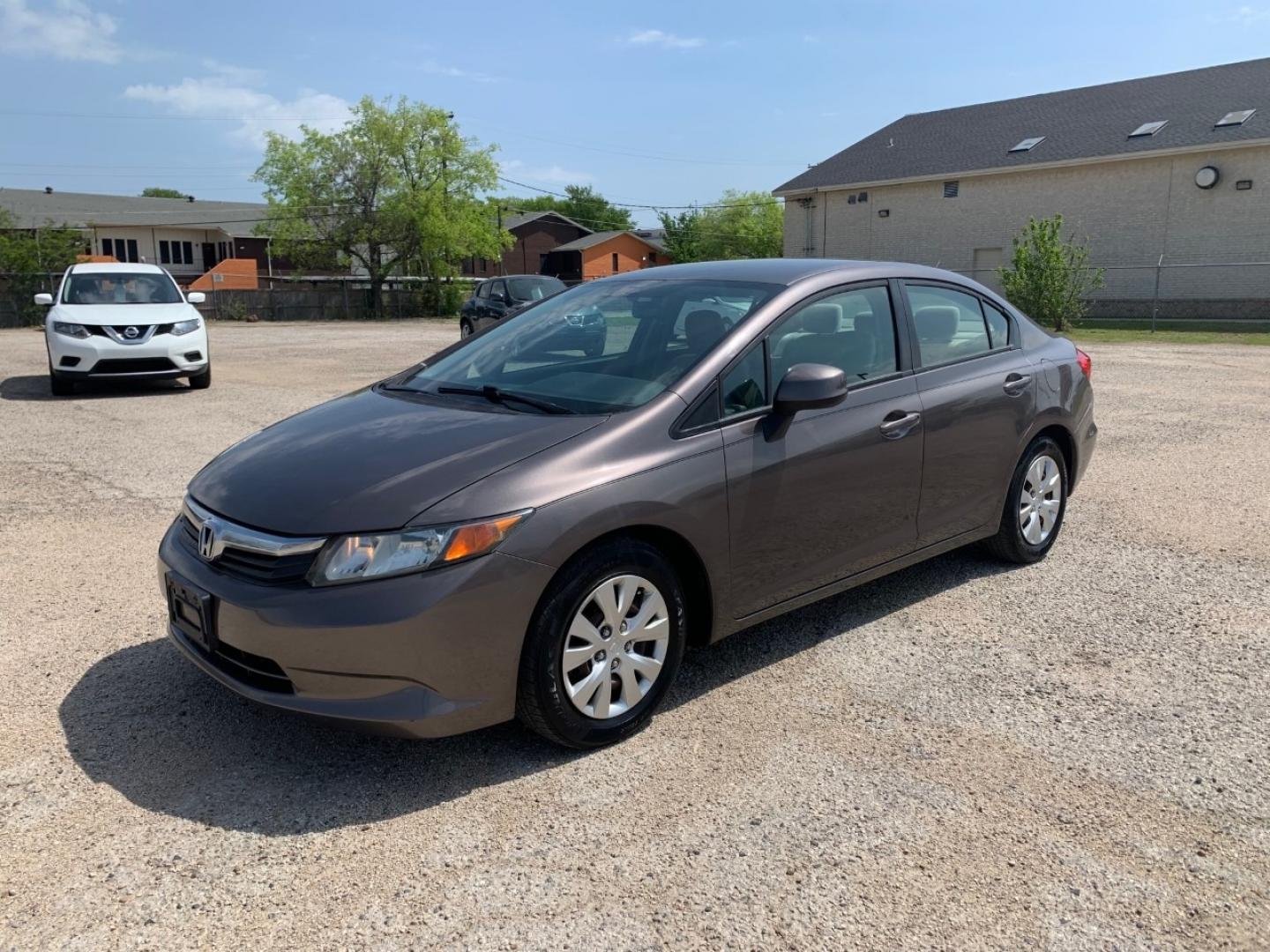 2012 Gold /Tan Honda Civic LX Sedan AT (2HGFB2F56CH) with an 1.8L L4 SOHC 16V engine, Automatic transmission, located at 1830 North Belt Line Road, Irving, TX, 75061, (469) 524-0199, 32.834373, -96.993584 - Photo#2