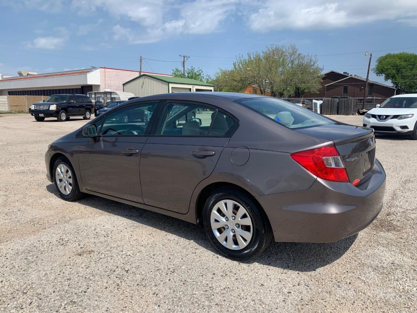 2012 Gold /Tan Honda Civic LX Sedan AT (2HGFB2F56CH) with an 1.8L L4 SOHC 16V engine, Automatic transmission, located at 1830 North Belt Line Road, Irving, TX, 75061, (469) 524-0199, 32.834373, -96.993584 - Photo#3