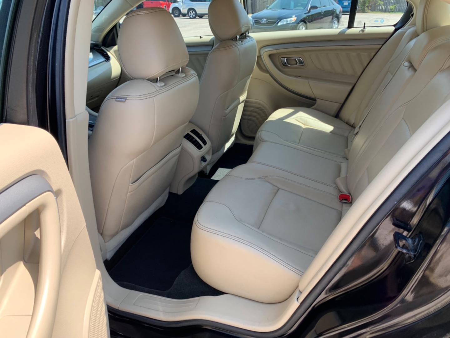 2014 Black /Tan Ford Taurus SEL FWD (1FAHP2E88EG) with an 3.5L V6 DOHC 24V engine, Automatic transmission, located at 1830 North Belt Line Road, Irving, TX, 75061, (469) 524-0199, 32.834373, -96.993584 - Photo#8