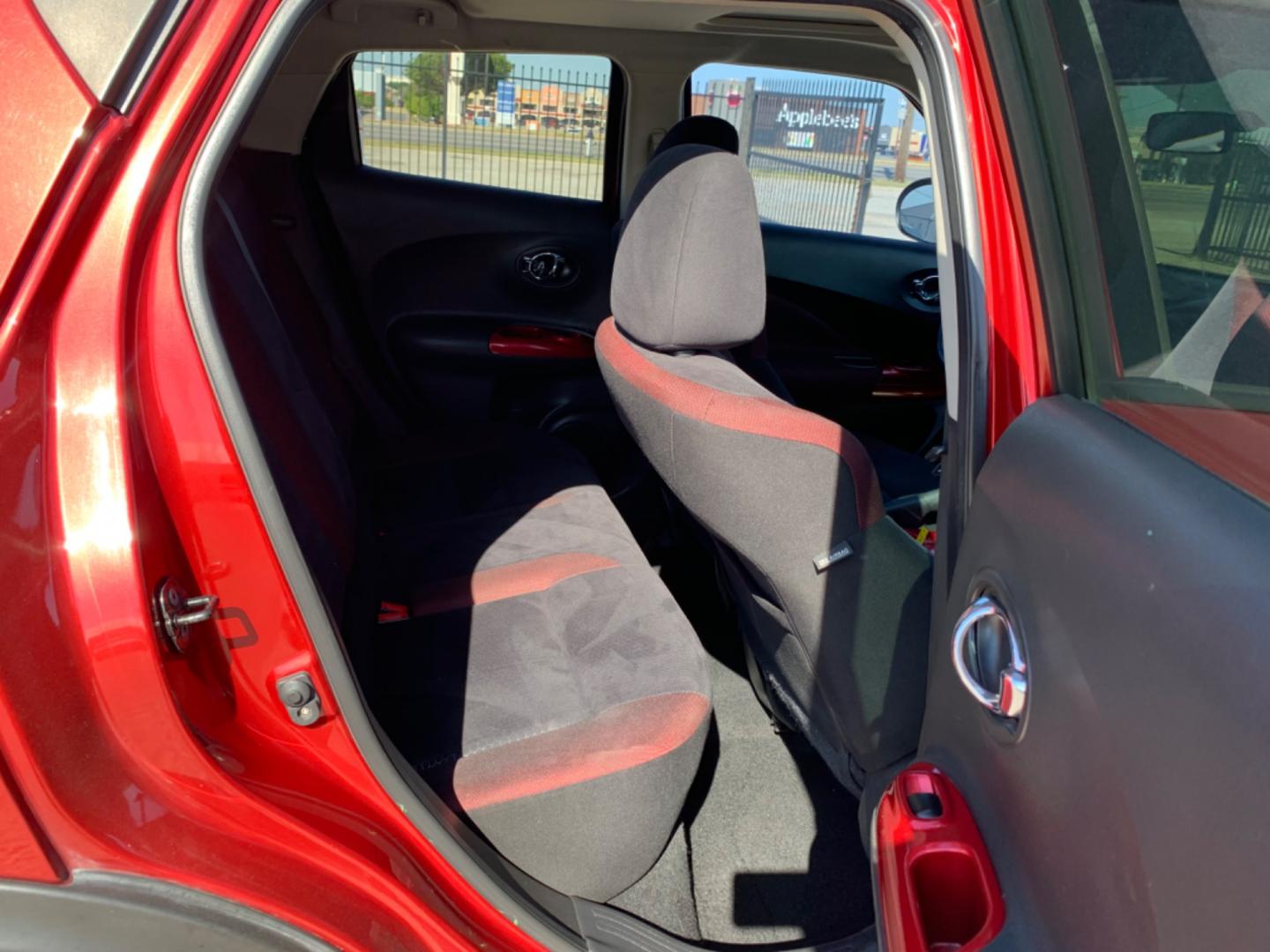 2012 Maroon /Black Nissan Juke S FWD (JN8AF5MR2CT) with an 1.6L L4 DOHC 16V engine, Automatic transmission, located at 1830 North Belt Line Road, Irving, TX, 75061, (469) 524-0199, 32.834373, -96.993584 - Photo#10