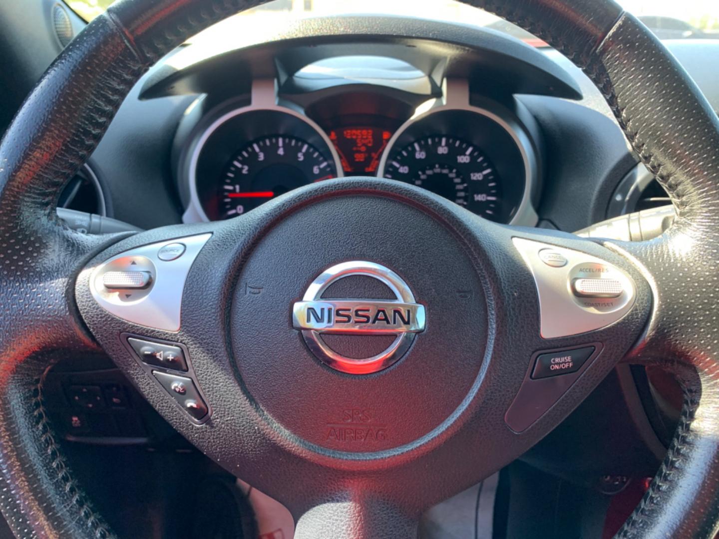 2012 Maroon /Black Nissan Juke S FWD (JN8AF5MR2CT) with an 1.6L L4 DOHC 16V engine, Automatic transmission, located at 1830 North Belt Line Road, Irving, TX, 75061, (469) 524-0199, 32.834373, -96.993584 - Photo#12