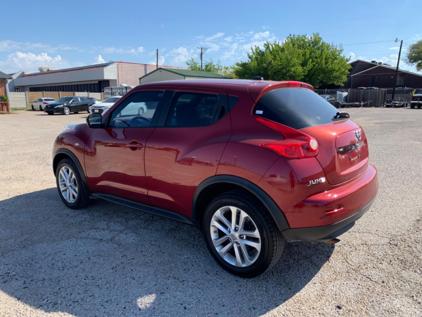 2012 Maroon /Black Nissan Juke S FWD (JN8AF5MR2CT) with an 1.6L L4 DOHC 16V engine, Automatic transmission, located at 1830 North Belt Line Road, Irving, TX, 75061, (469) 524-0199, 32.834373, -96.993584 - Photo#3