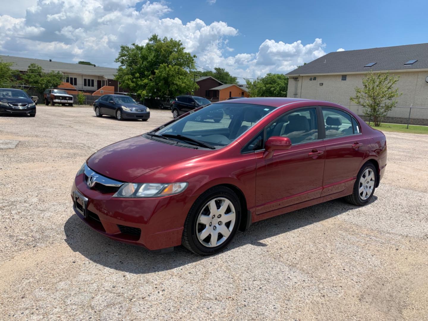 2009 Maroon /Tan Honda Civic LX (1HGFA16569L) with an 1.8L 1799cc GAS MFI type R18A1 - 4 valve SOHC engine, Automatic transmission, located at 1830 North Belt Line Road, Irving, TX, 75061, (469) 524-0199, 32.834373, -96.993584 - Photo#4