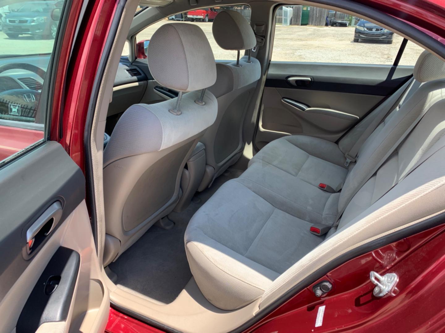 2009 Maroon /Tan Honda Civic LX (1HGFA16569L) with an 1.8L 1799cc GAS MFI type R18A1 - 4 valve SOHC engine, Automatic transmission, located at 1830 North Belt Line Road, Irving, TX, 75061, (469) 524-0199, 32.834373, -96.993584 - Photo#8