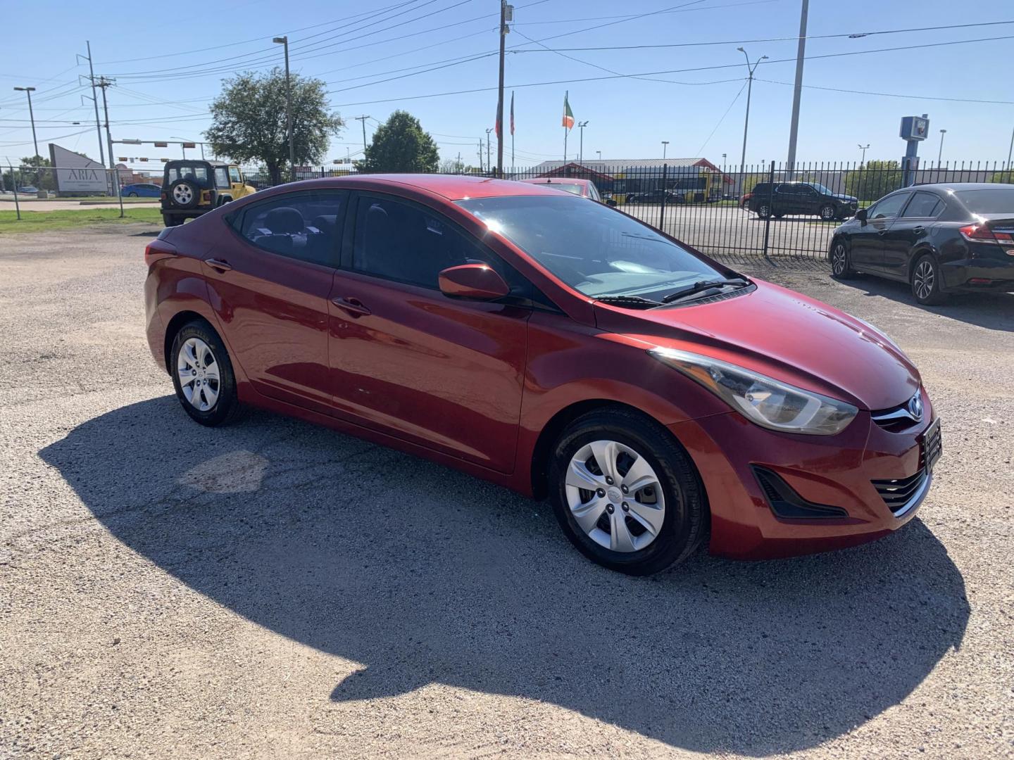 2016 Maroon /gray Hyundai Elantra Limited (5NPDH4AE2GH) with an 1.8L L4 DOHC 16V engine, Automatic transmission, located at 1830 North Belt Line Road, Irving, TX, 75061, (469) 524-0199, 32.834373, -96.993584 - Photo#6