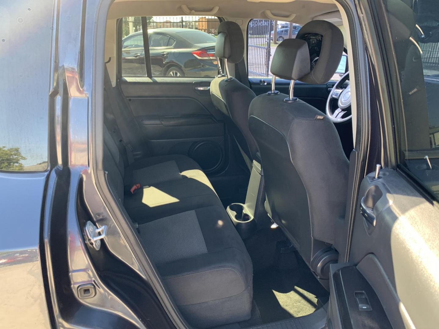 2016 Gray /Black Jeep Compass Sport FWD (1C4NJCBAXGD) with an 2.0L L4 DOHC 16V engine, AUTOMATIC transmission, located at 1830 North Belt Line Road, Irving, TX, 75061, (469) 524-0199, 32.834373, -96.993584 - Photo#11