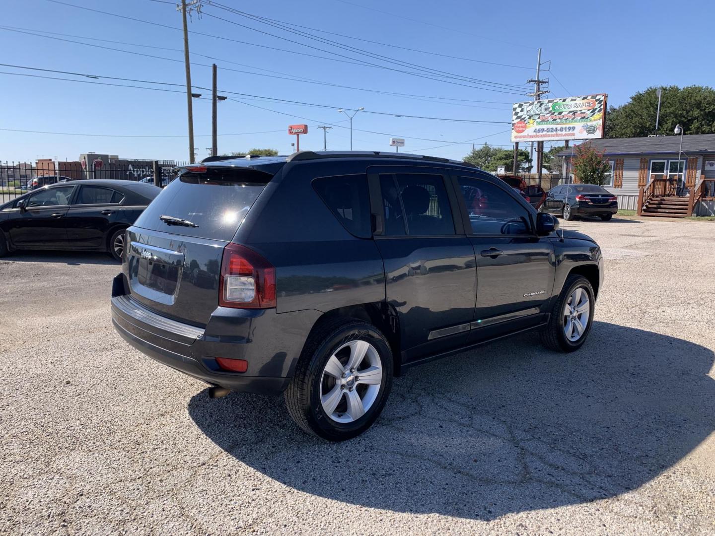 2016 Gray /Black Jeep Compass Sport FWD (1C4NJCBAXGD) with an 2.0L L4 DOHC 16V engine, AUTOMATIC transmission, located at 1830 North Belt Line Road, Irving, TX, 75061, (469) 524-0199, 32.834373, -96.993584 - Photo#6