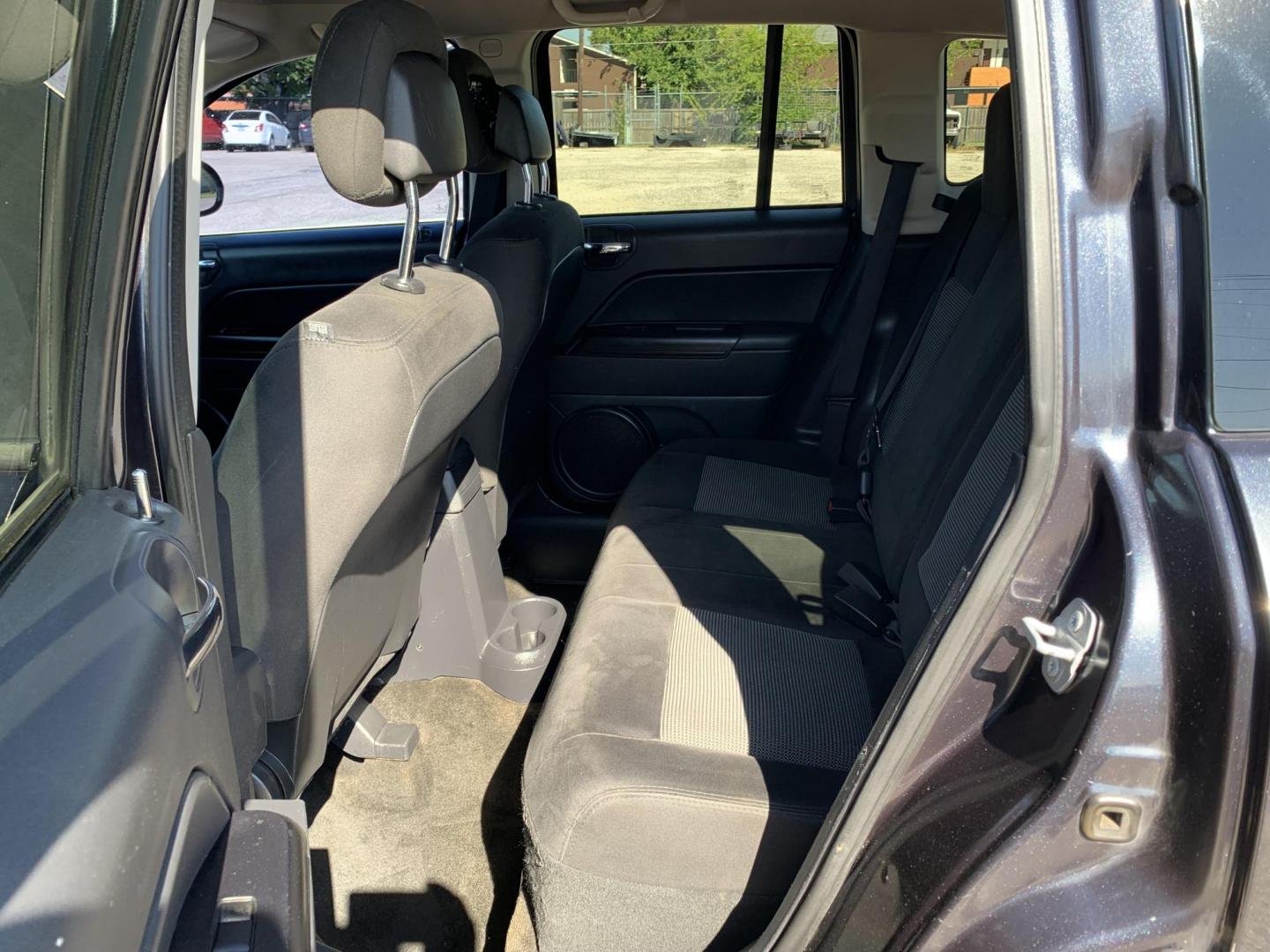 2016 Gray /Black Jeep Compass Sport FWD (1C4NJCBAXGD) with an 2.0L L4 DOHC 16V engine, AUTOMATIC transmission, located at 1830 North Belt Line Road, Irving, TX, 75061, (469) 524-0199, 32.834373, -96.993584 - Photo#9