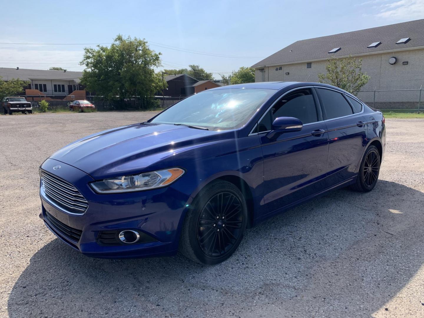 2016 blue /Black Ford Fusion SE (3FA6P0HD8GR) with an 1.5L L4 DOHC 16V engine, Automatic transmission, located at 1830 North Belt Line Road, Irving, TX, 75061, (469) 524-0199, 32.834373, -96.993584 - Photo#2