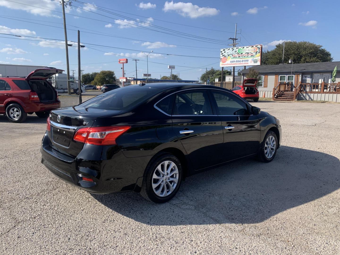 2019 Black /Black Nissan Sentra S CVT (3N1AB7APXKY) with an 1.8L L4 SFI DOHC 16V engine, AUTOMATIC transmission, located at 1830 North Belt Line Road, Irving, TX, 75061, (469) 524-0199, 32.834373, -96.993584 - Photo#5