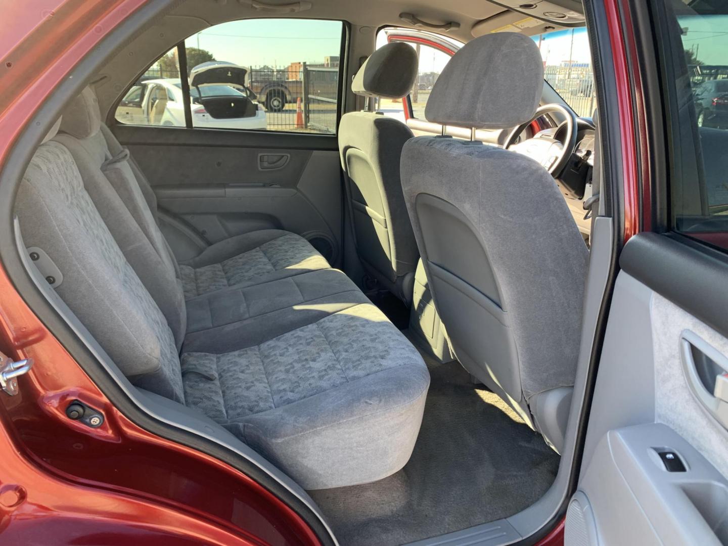 2008 Maroon /gray Kia Sorento Base (KNDJD735785) with an 3.3L V6 DOHC 24V engine, AUTOMATIC transmission, located at 1830 North Belt Line Road, Irving, TX, 75061, (469) 524-0199, 32.834373, -96.993584 - Photo#10