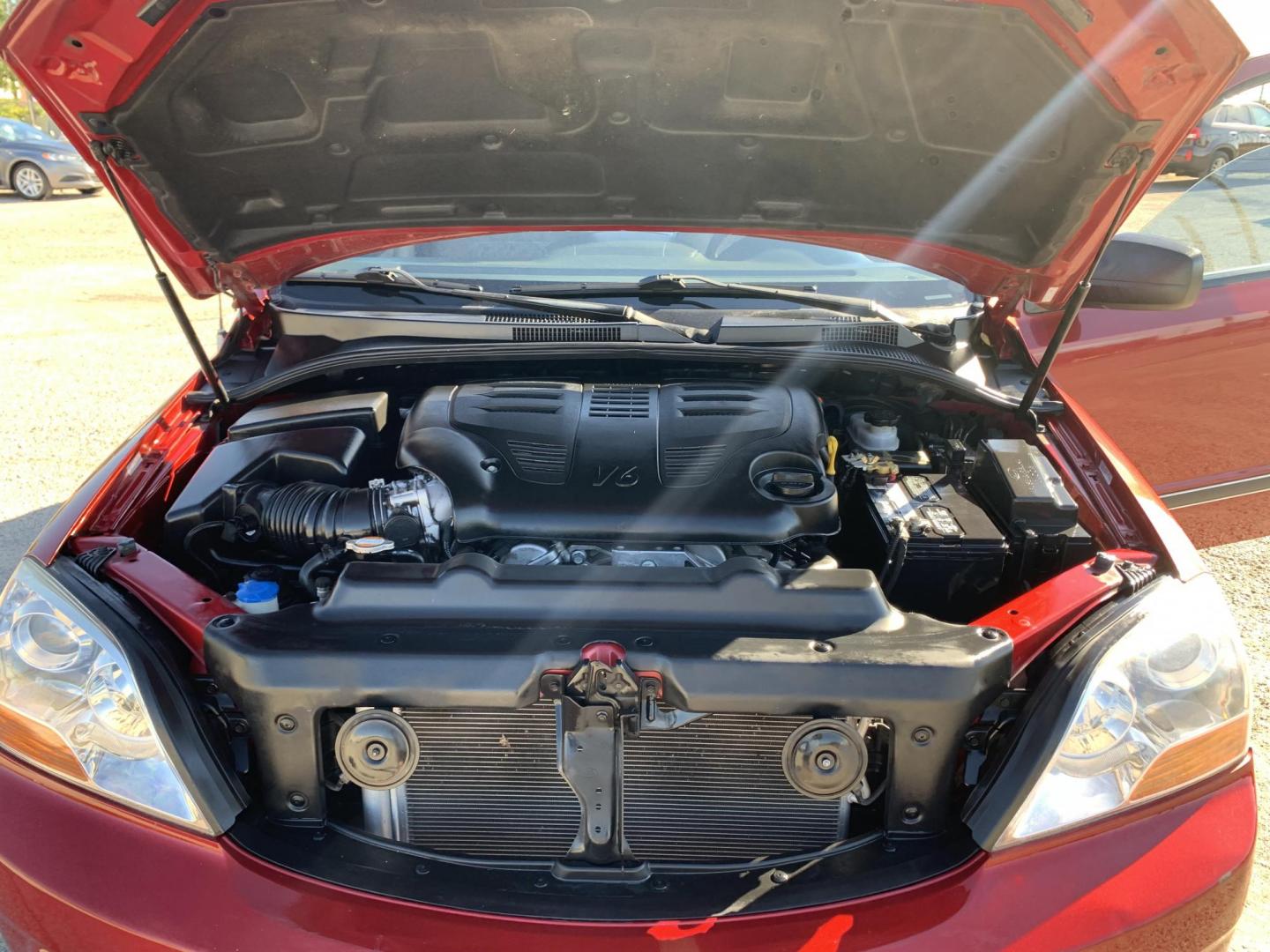 2008 Maroon /gray Kia Sorento Base (KNDJD735785) with an 3.3L V6 DOHC 24V engine, AUTOMATIC transmission, located at 1830 North Belt Line Road, Irving, TX, 75061, (469) 524-0199, 32.834373, -96.993584 - Photo#12