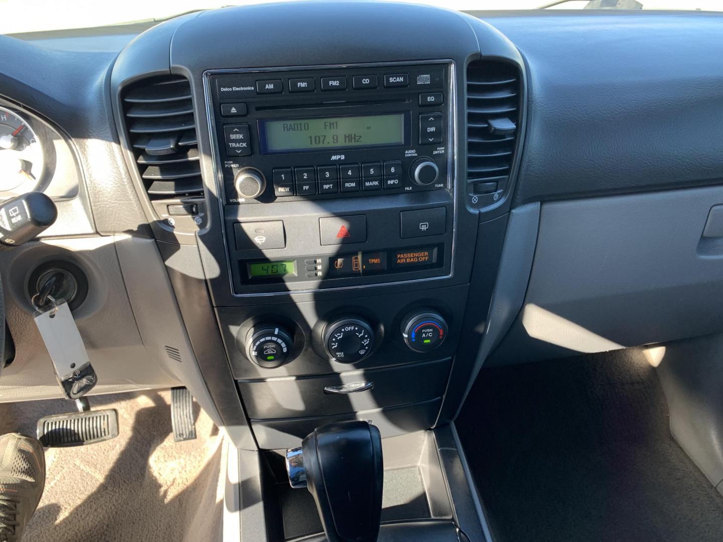 2008 Maroon /gray Kia Sorento Base (KNDJD735785) with an 3.3L V6 DOHC 24V engine, AUTOMATIC transmission, located at 1830 North Belt Line Road, Irving, TX, 75061, (469) 524-0199, 32.834373, -96.993584 - Photo#13