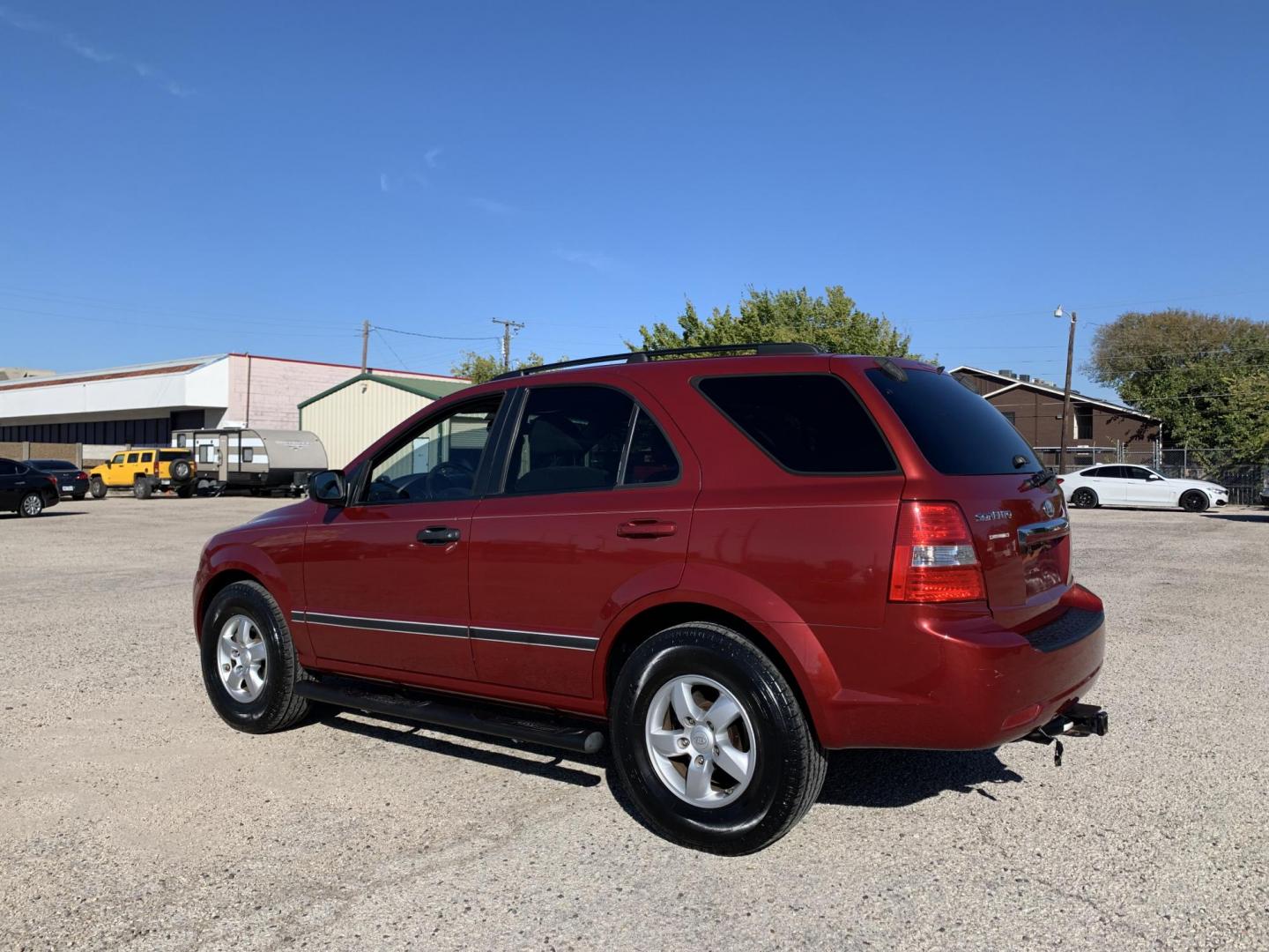 2008 Maroon /gray Kia Sorento Base (KNDJD735785) with an 3.3L V6 DOHC 24V engine, AUTOMATIC transmission, located at 1830 North Belt Line Road, Irving, TX, 75061, (469) 524-0199, 32.834373, -96.993584 - Photo#3