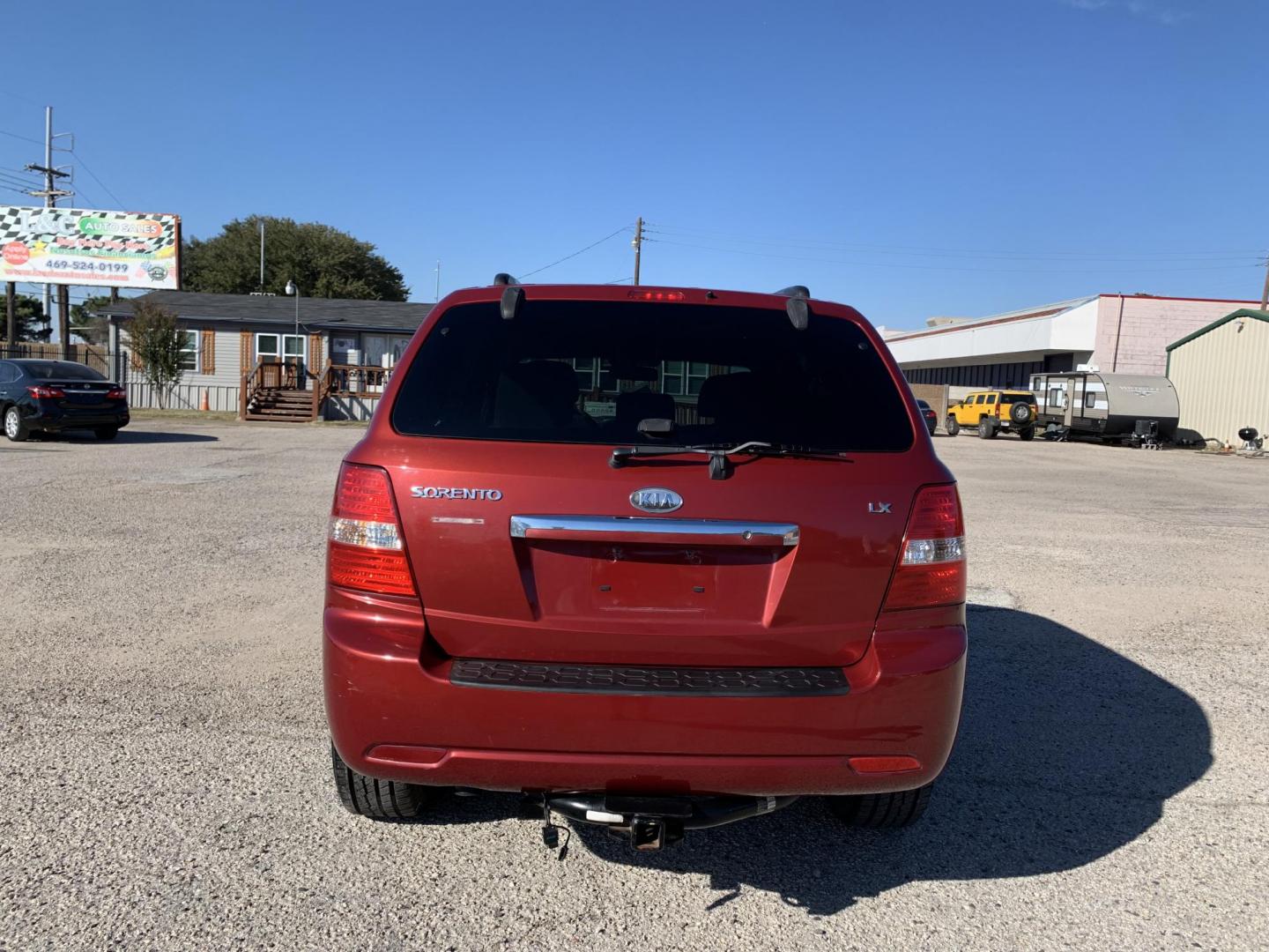 2008 Maroon /gray Kia Sorento Base (KNDJD735785) with an 3.3L V6 DOHC 24V engine, AUTOMATIC transmission, located at 1830 North Belt Line Road, Irving, TX, 75061, (469) 524-0199, 32.834373, -96.993584 - Photo#4