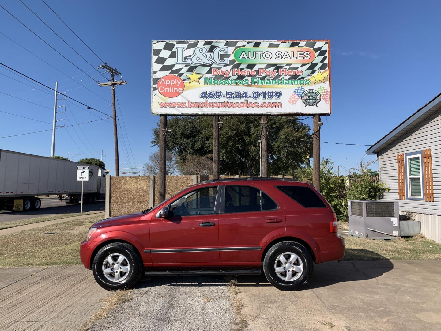 2008 Maroon /gray Kia Sorento Base (KNDJD735785) with an 3.3L V6 DOHC 24V engine, AUTOMATIC transmission, located at 1830 North Belt Line Road, Irving, TX, 75061, (469) 524-0199, 32.834373, -96.993584 - Photo#0