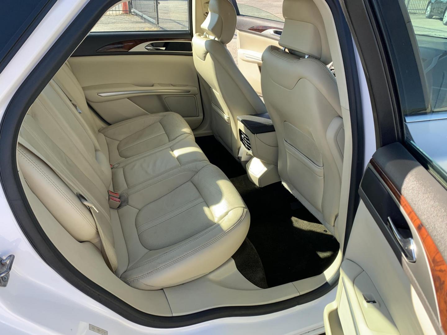 2014 White /Tan Lincoln MKZ FWD (3LN6L2G98ER) with an 2.0L L4 DOHC 16V engine, AUTOMATIC transmission, located at 1830 North Belt Line Road, Irving, TX, 75061, (469) 524-0199, 32.834373, -96.993584 - Photo#9