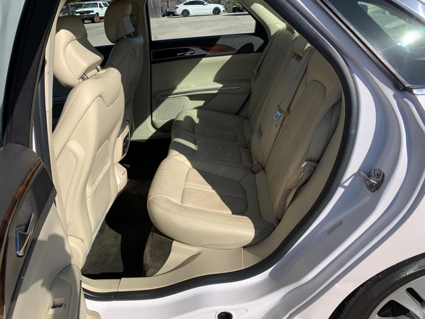 2014 White /Tan Lincoln MKZ FWD (3LN6L2G98ER) with an 2.0L L4 DOHC 16V engine, AUTOMATIC transmission, located at 1830 North Belt Line Road, Irving, TX, 75061, (469) 524-0199, 32.834373, -96.993584 - Photo#8