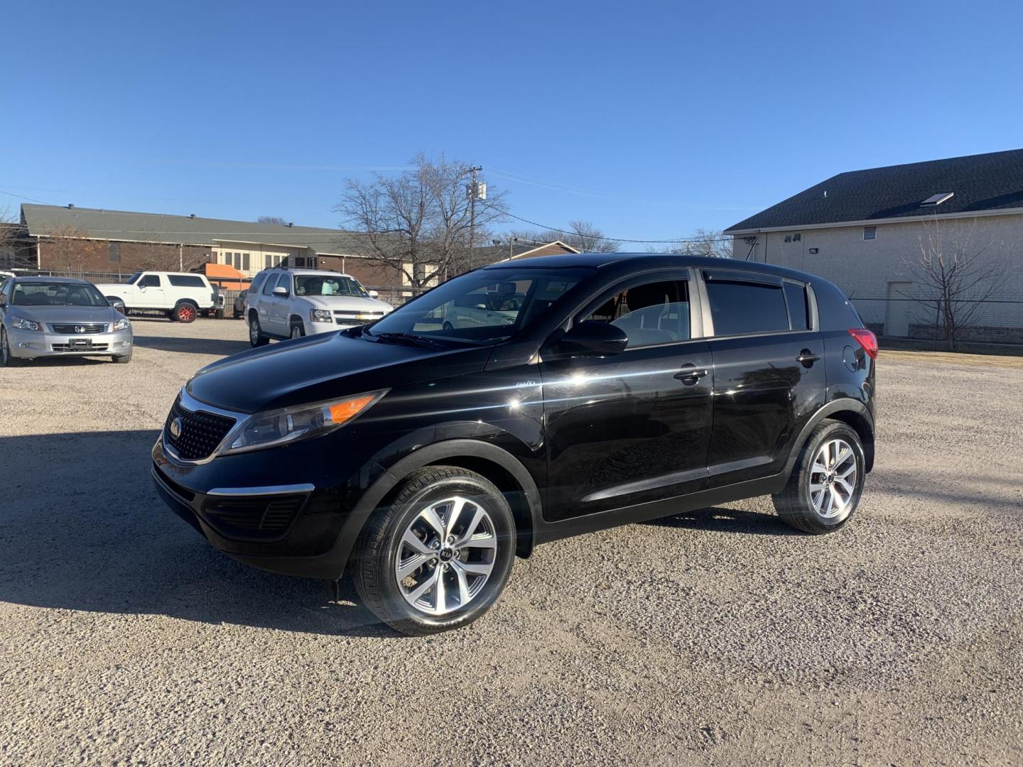 2015 Black /gray Kia Sportage LX AWD (KNDPBCAC9F7) with an 2.4L V6 DOHC 24V engine, AUTOMATIC transmission, located at 1830 North Belt Line Road, Irving, TX, 75061, (469) 524-0199, 32.834373, -96.993584 - Photo#2