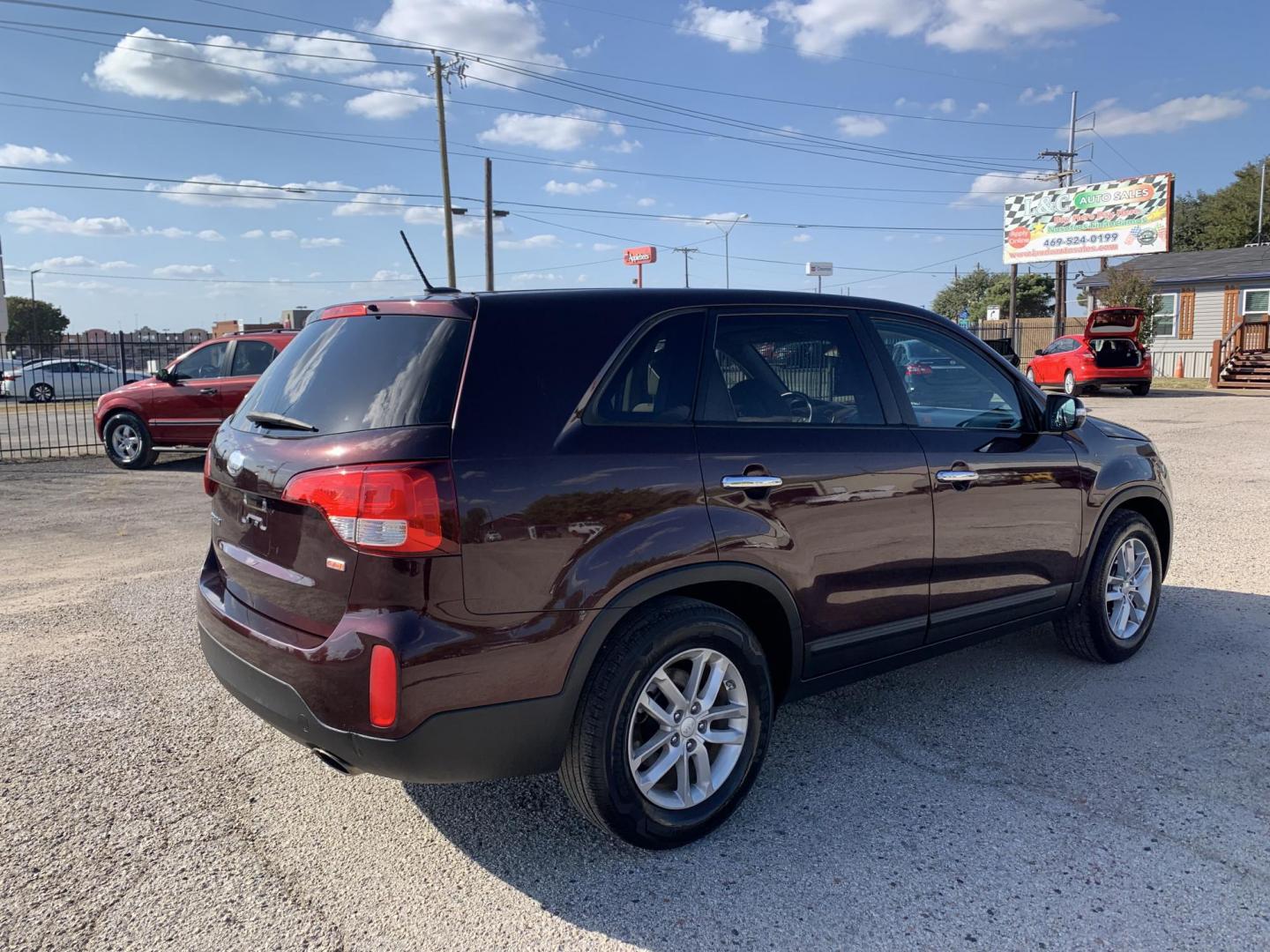 2014 Kia Sorento LX 2WD (5XYKT3A61EG) with an 2.4L L4 DOHC 16V engine, AUTOMATIC transmission, located at 1830 North Belt Line Road, Irving, TX, 75061, (469) 524-0199, 32.834373, -96.993584 - Photo#2